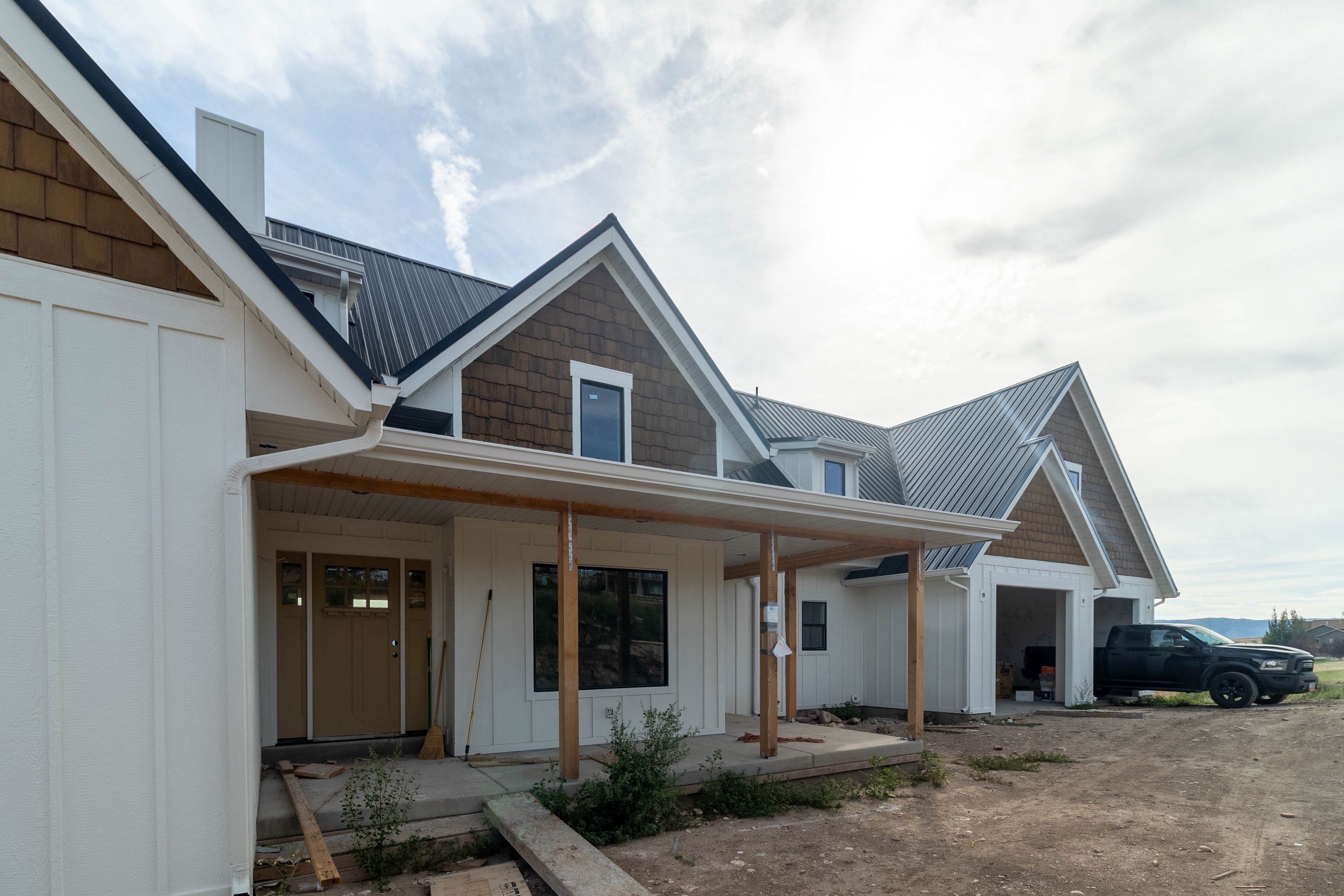 LP SmartSide Siding and Metal Roofing Installation in Garden City by Garner Construction