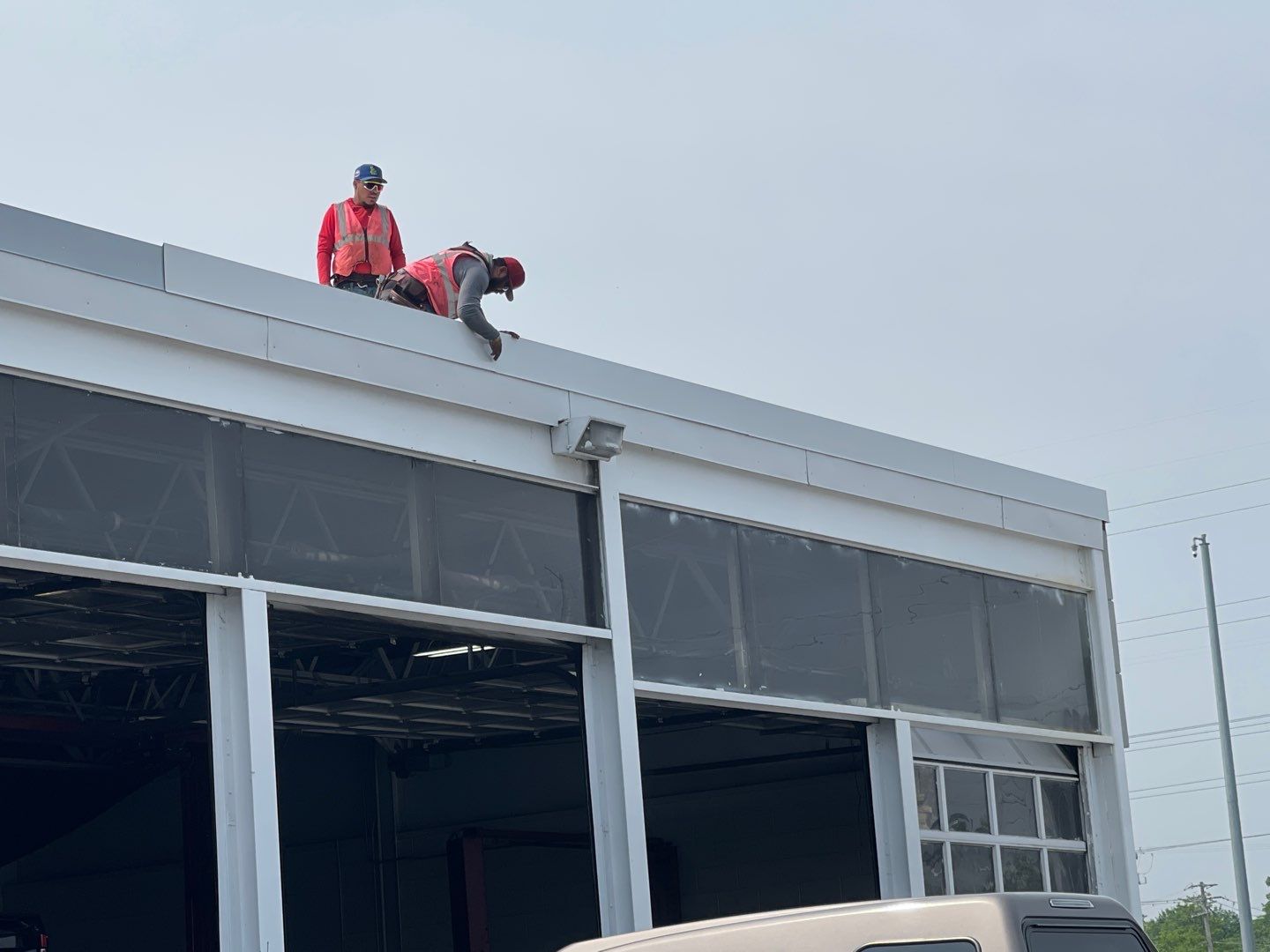 Ford Dealership - Re-Roof by Pink Roofing