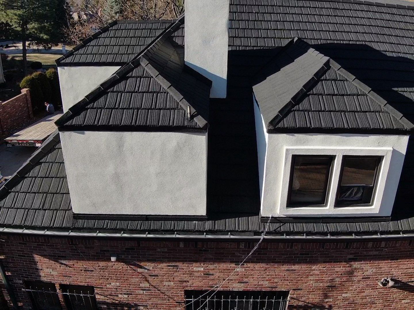 Unified Stone Coated Roof & Stucco Remodle by Blue Peaks Roofing LLC