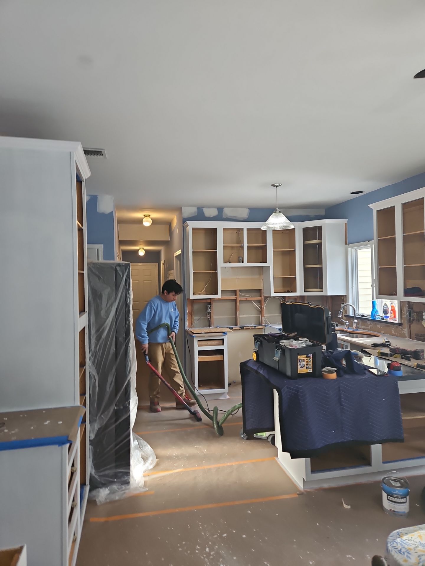 Cabinet Refinishing using Benjamin Moore Command by Spectrum Painting, LLC