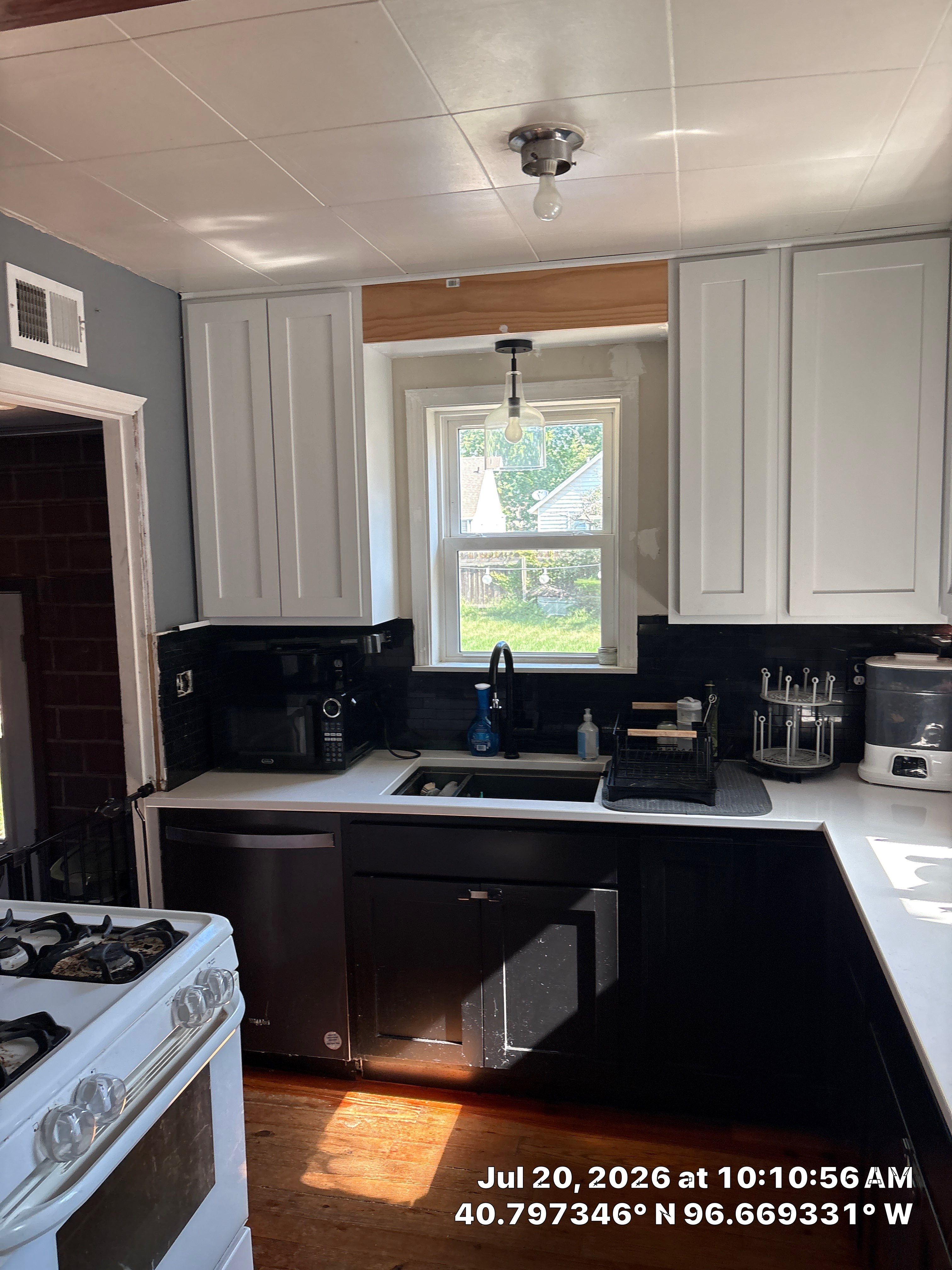 Modern Kitchen Remodel with Two-Tone Cabinetry in Lincoln by CompanyCam Sales Demo