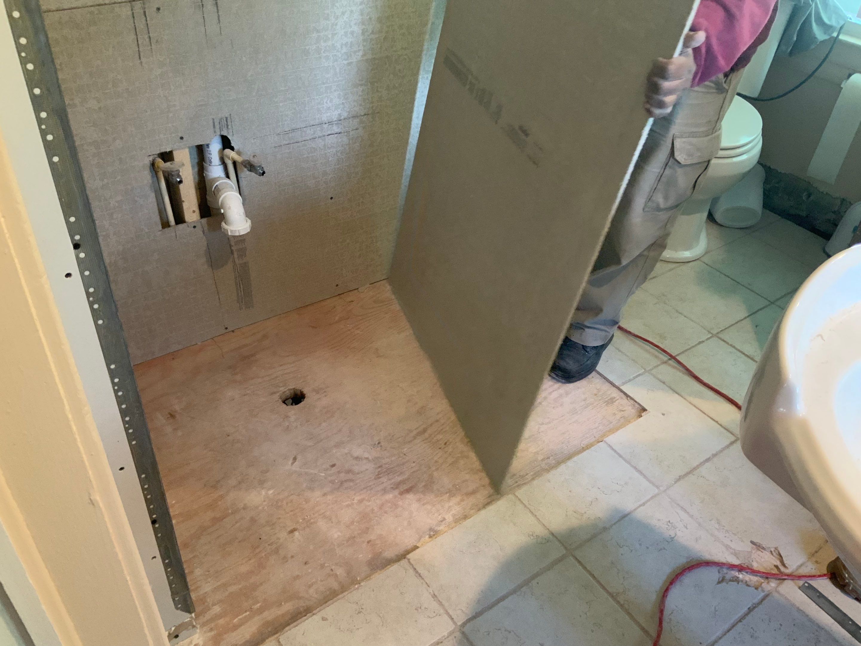 Bathroom Remodel using New Bathroom Tile and Tube by Alpha Design Services
