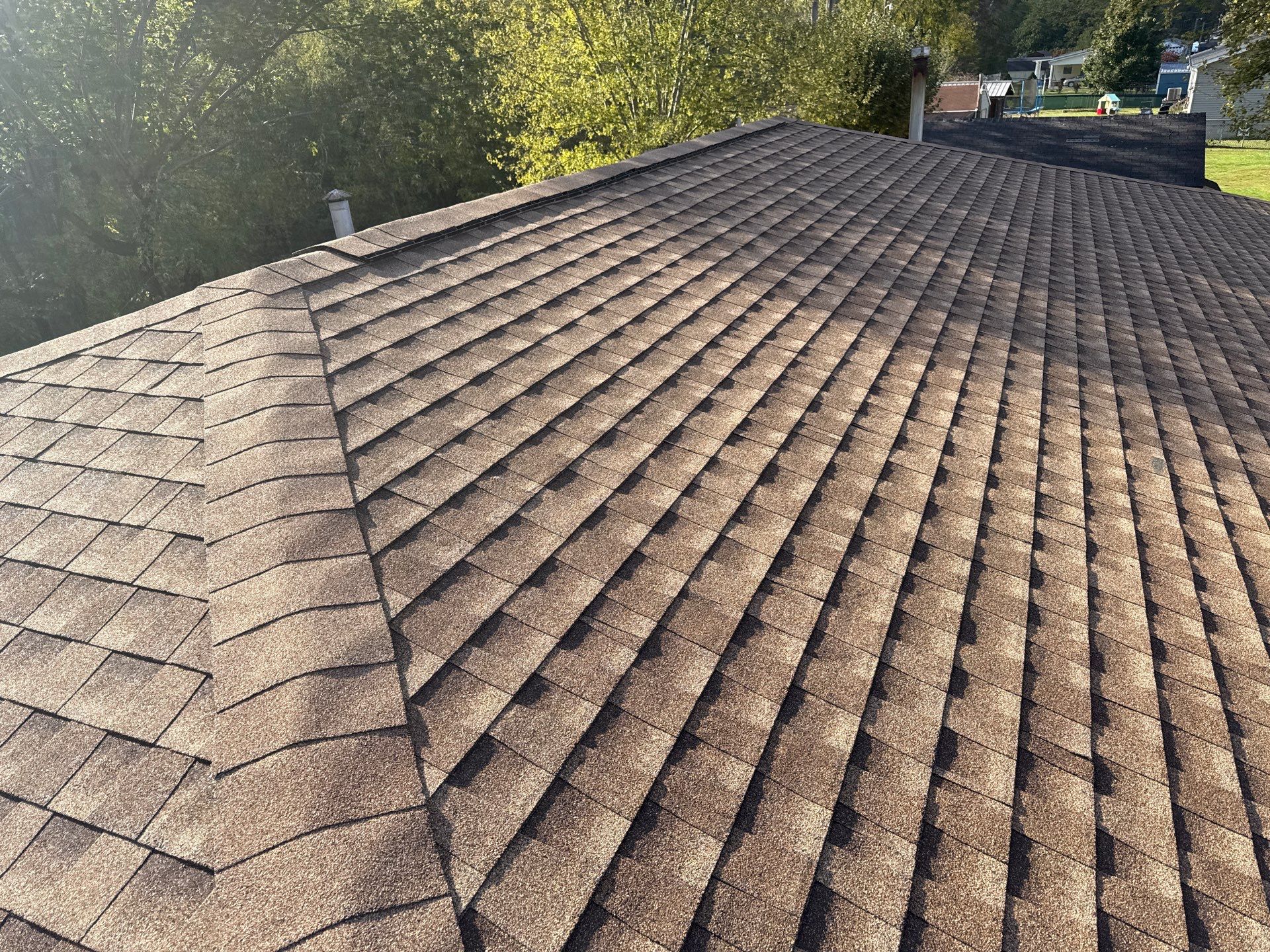Residential Roofing Installation using GAF Timberline HDZ Shakewood by Rainstoppers Roofing