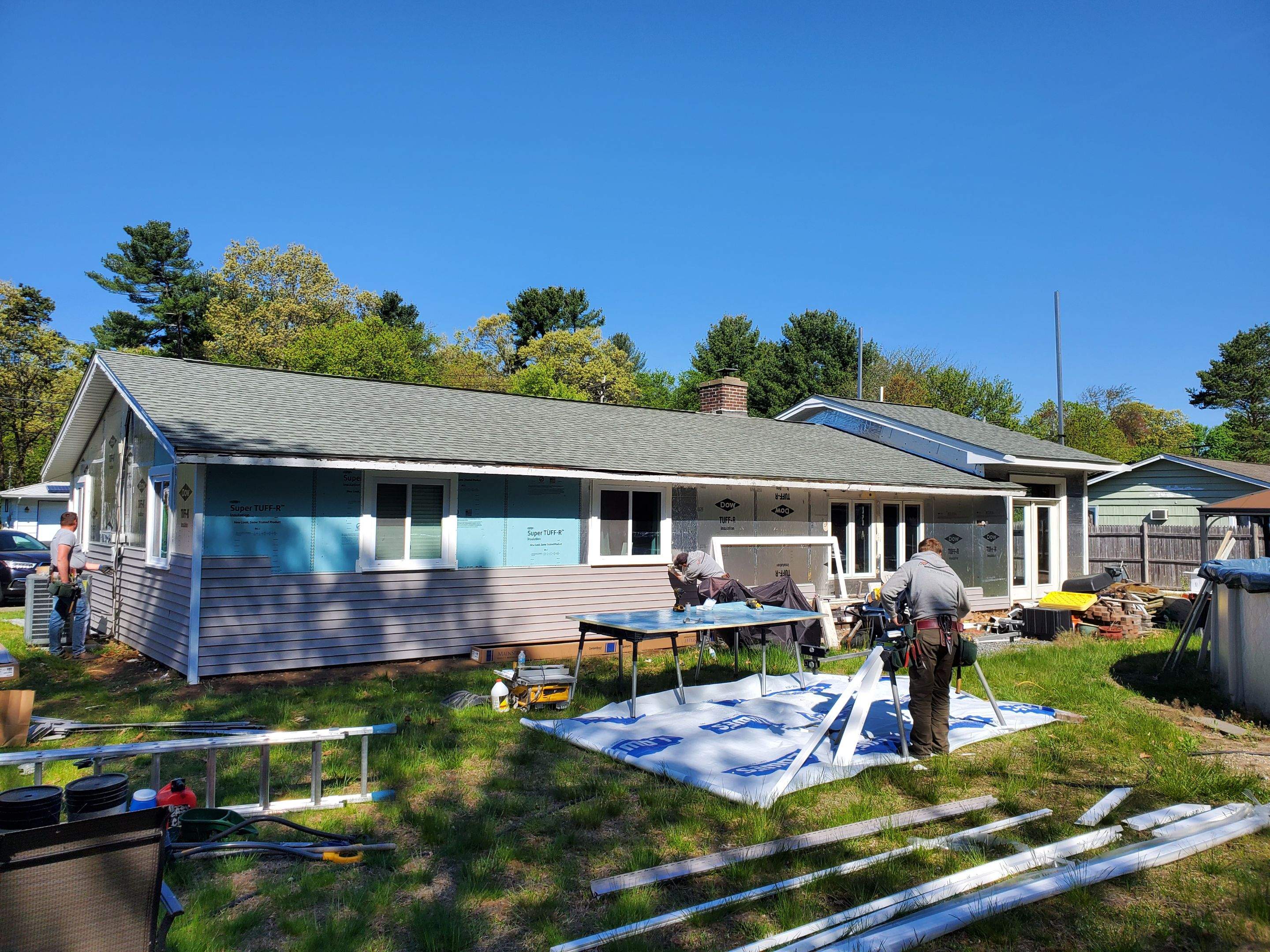 Siding Installation using insulation, PVC trim and vinyl siding by UBrothers Construction