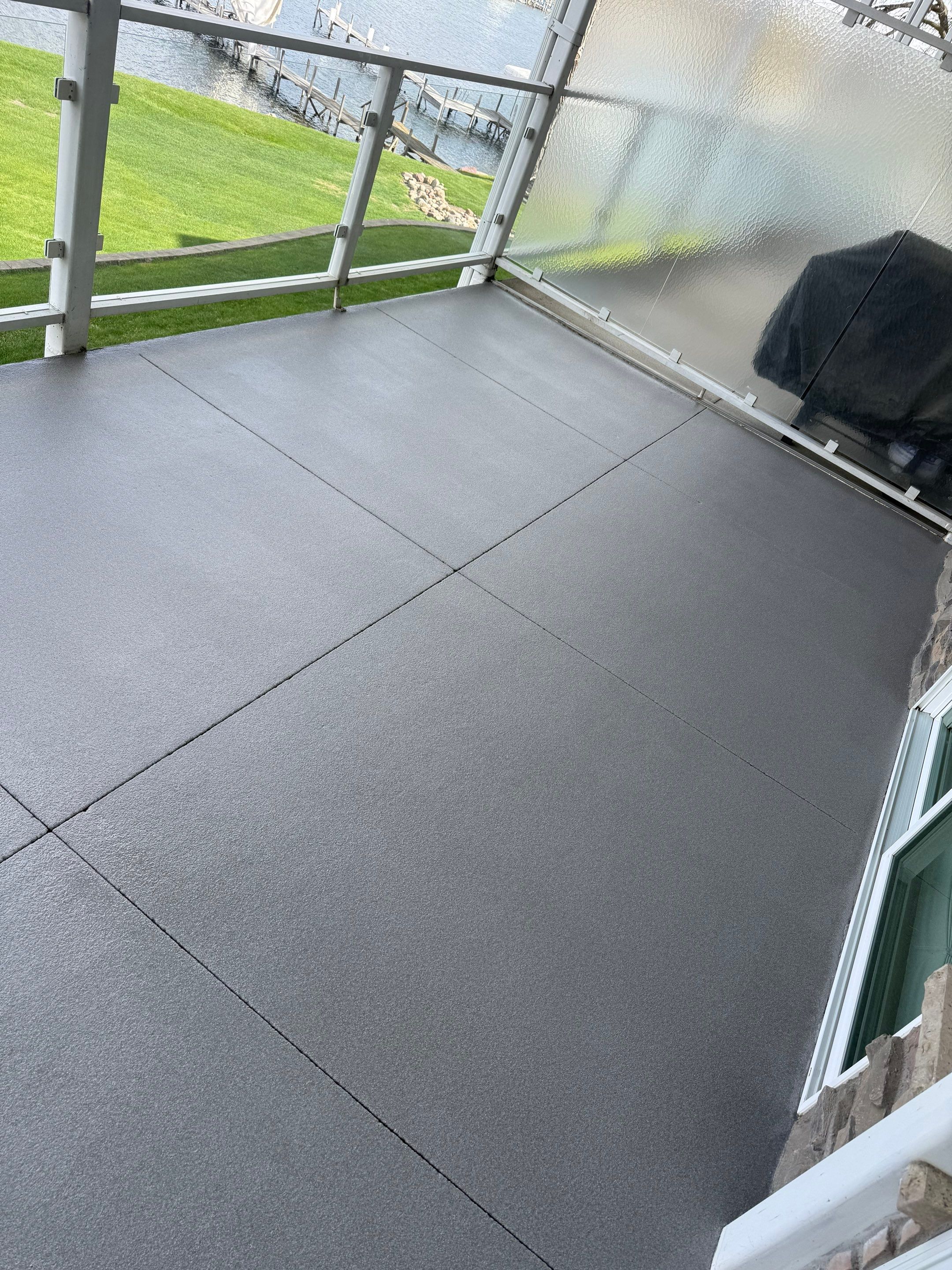 Dark Gray Slip-Resistant Concrete Coating for Arnolds Park Balcony by Select Painting, Coatings & Garage Cabinets