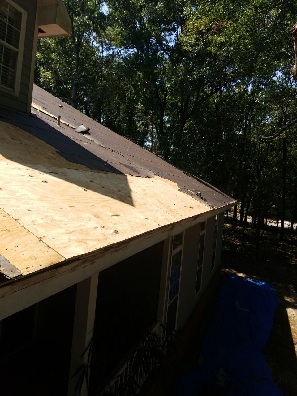 Residential Roofing Installation using Roof Replacement by American Roofing & Construction LLC