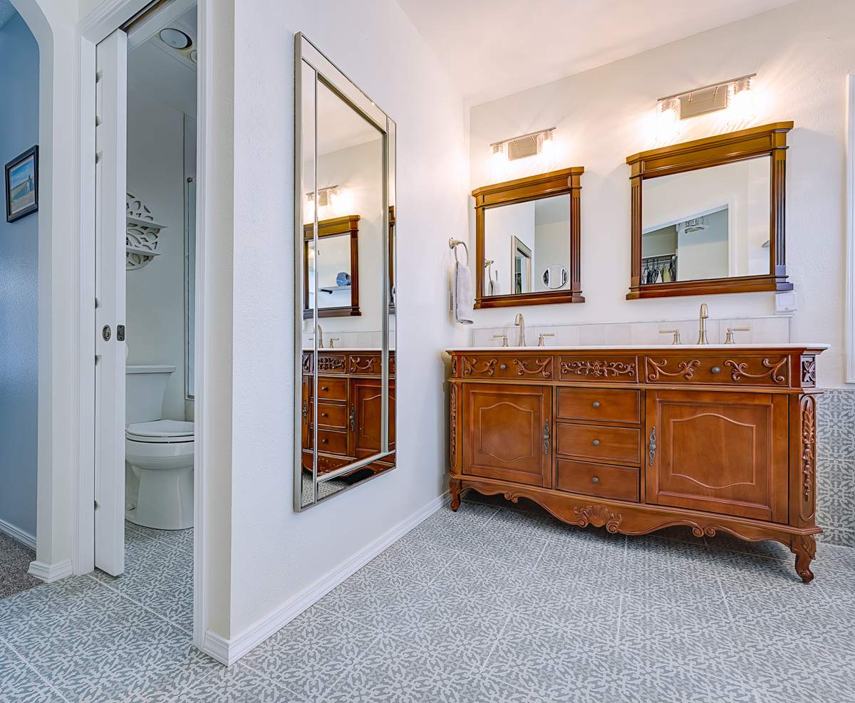 Milwaukie Dual Bathroom Remodel by American Made Construction 