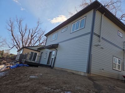 New gutters and downspouts