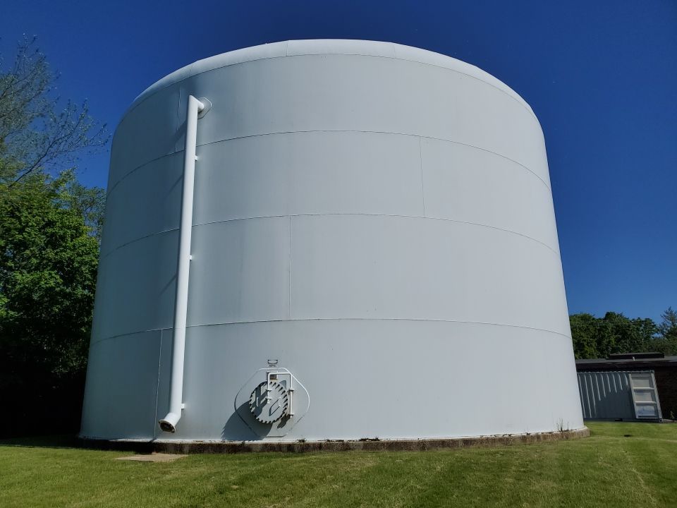 Water tank cleaning by Northern Power Washing LLC.
