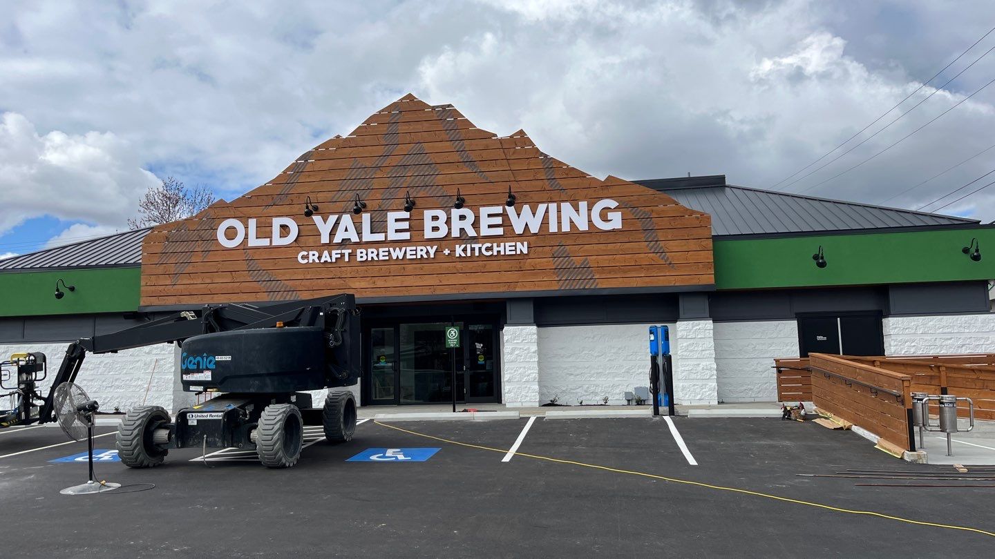 Commercial Roofing Installation using 12" Prolok metal and hidden gutters! by Top Notch Roofing Inc