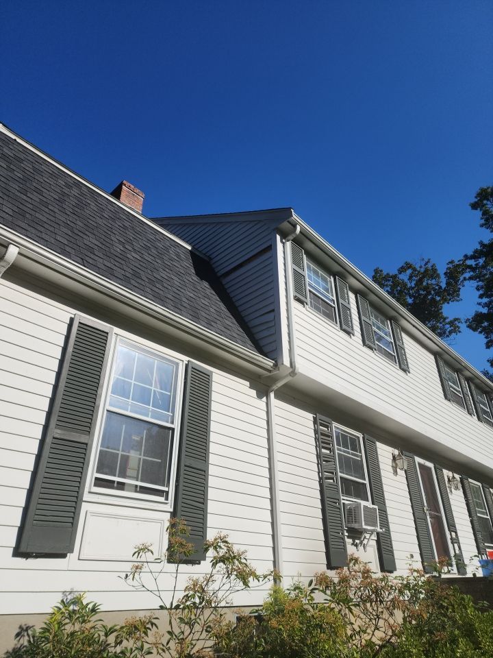 Custom window trim work and siding replacement in Dover, MA by UBrothers Construction