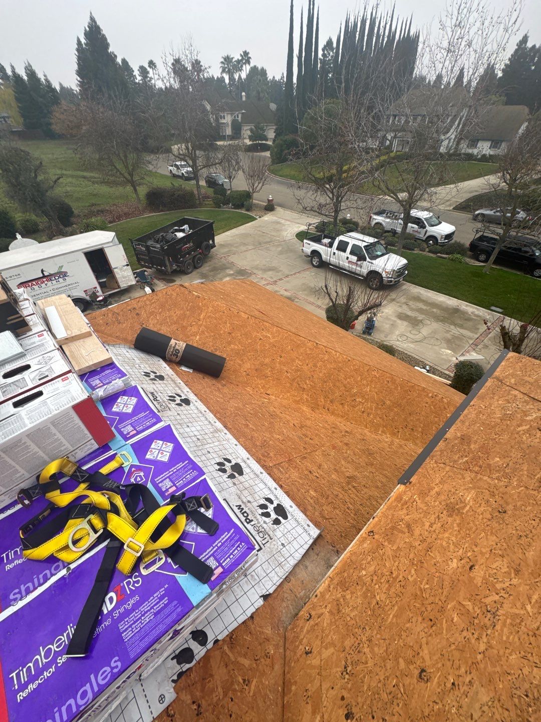 New shingles and gutters using GAF Timberline HDZ shingles and aluminum gutter by Straight Edge Roofing Inc
