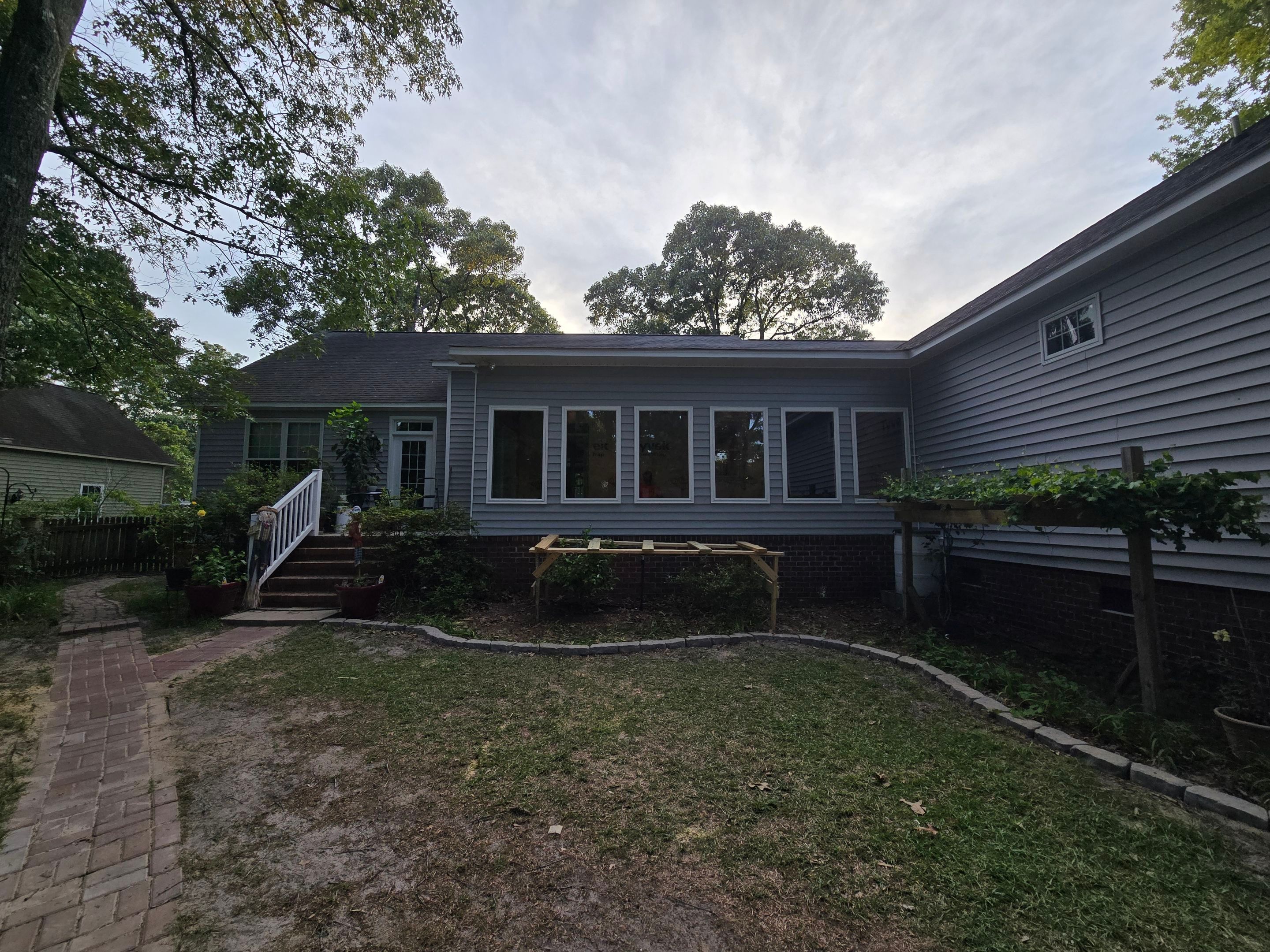 Custom Sunroom Conversion and Window Installation in New Bern by The Remodeling Company