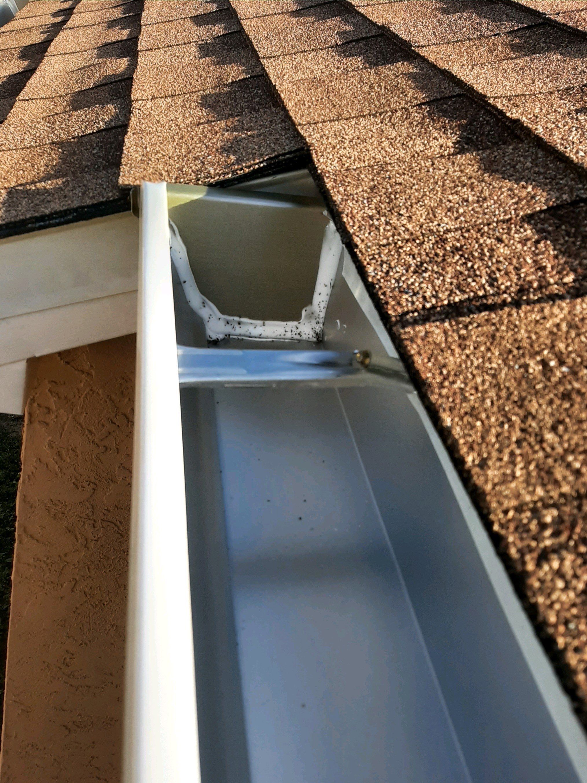 Seamless Gutter Installation using White K-Style Gutters by Gutter Professors