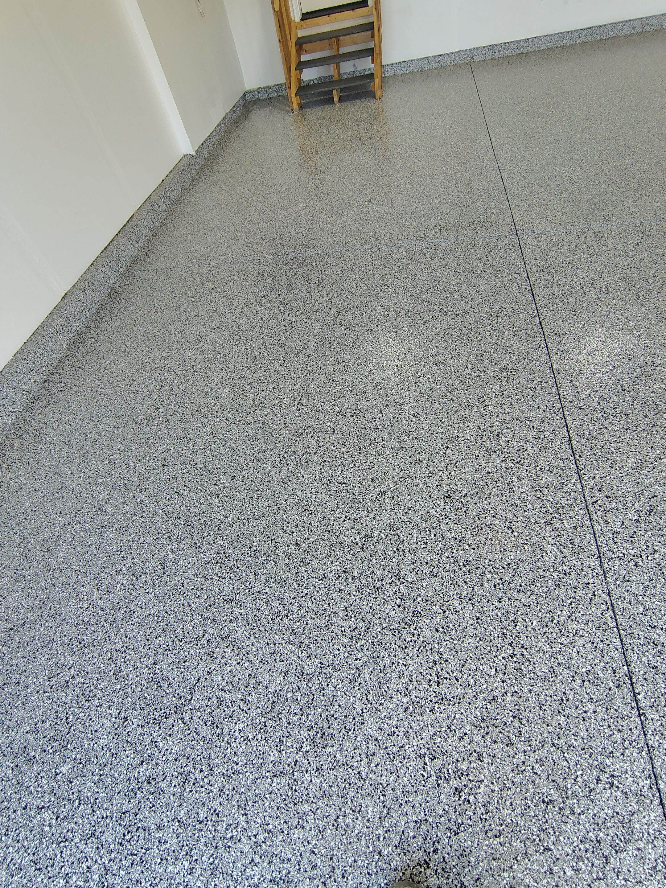 Decorative Flake Garage Floor Coating Installation in Tea, South Dakota by Select Painting, Coatings & Garage Cabinets