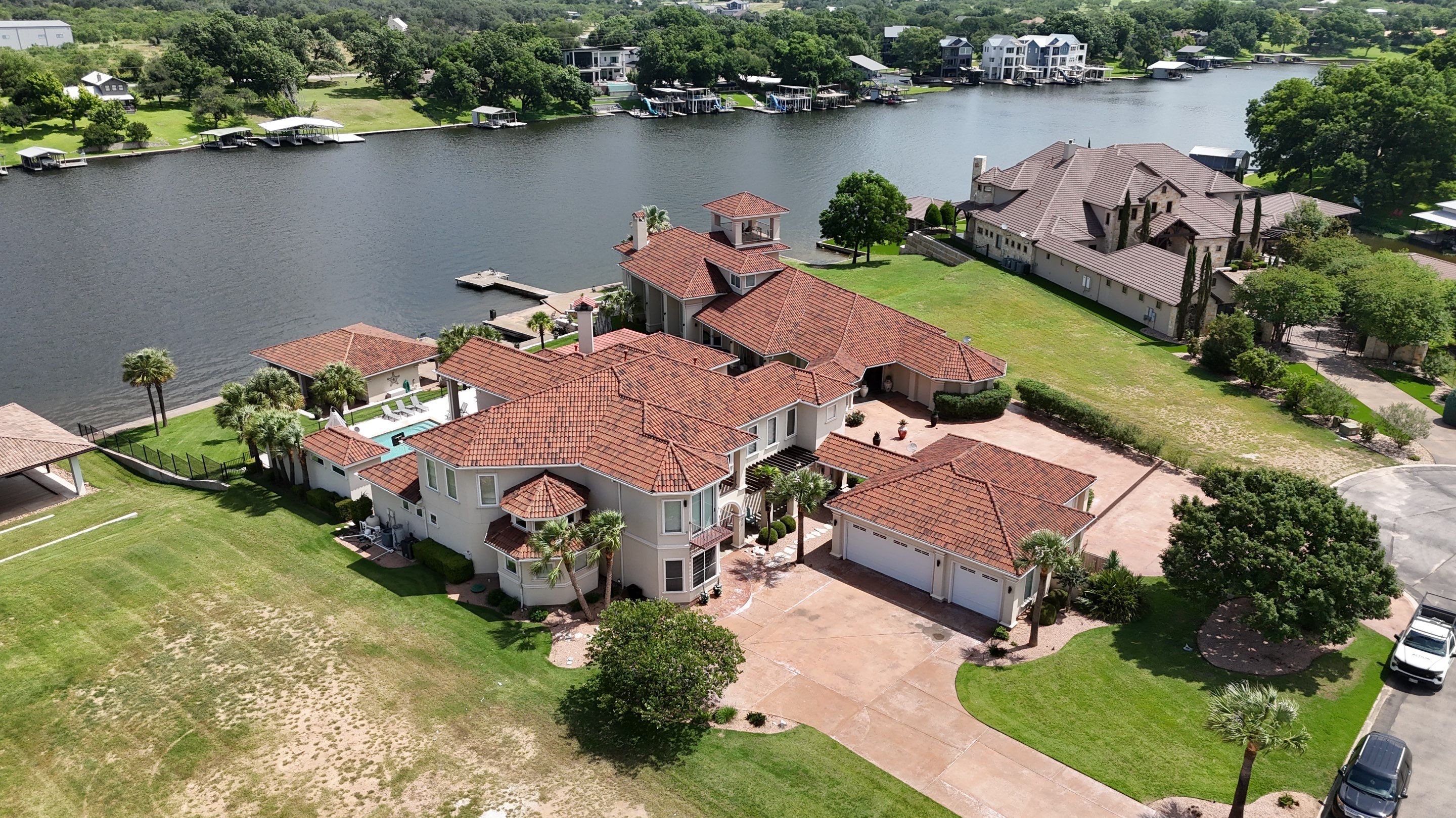 Residential Roof Replacement using Tile - Claymex Half Barrel by Action Exteriors Austin