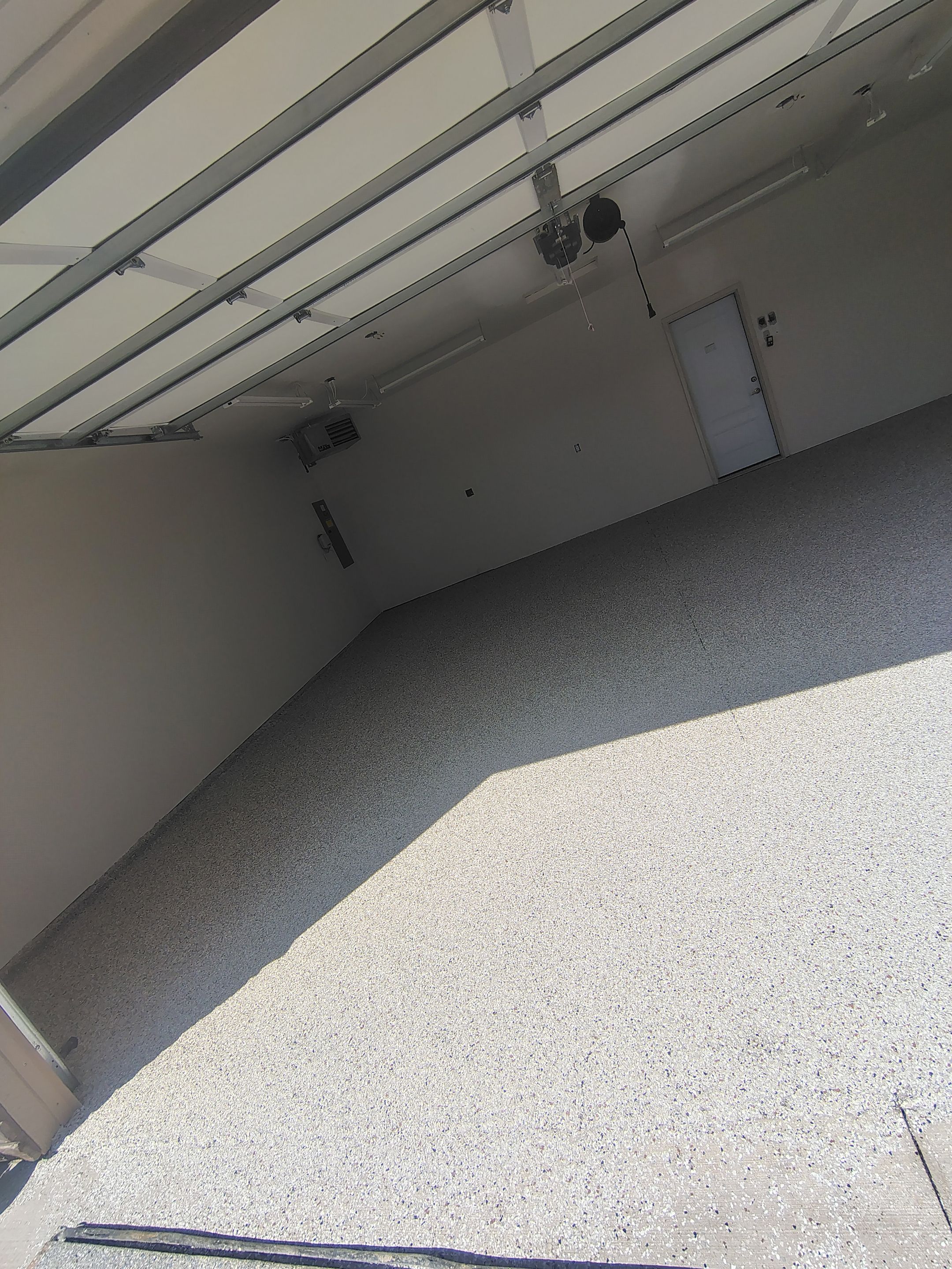 Garage Floor Coating with Coyote Decorative Chip in Tea by Select Painting, Coatings & Garage Cabinets