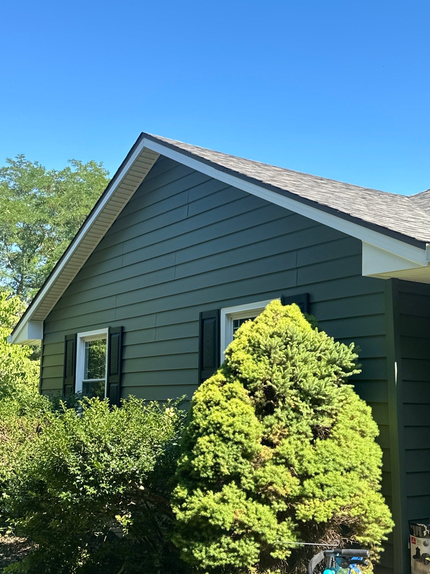 New Craneboard Siding on this Platte City, Mo home  by EEC  Windows, Siding & Roofing 