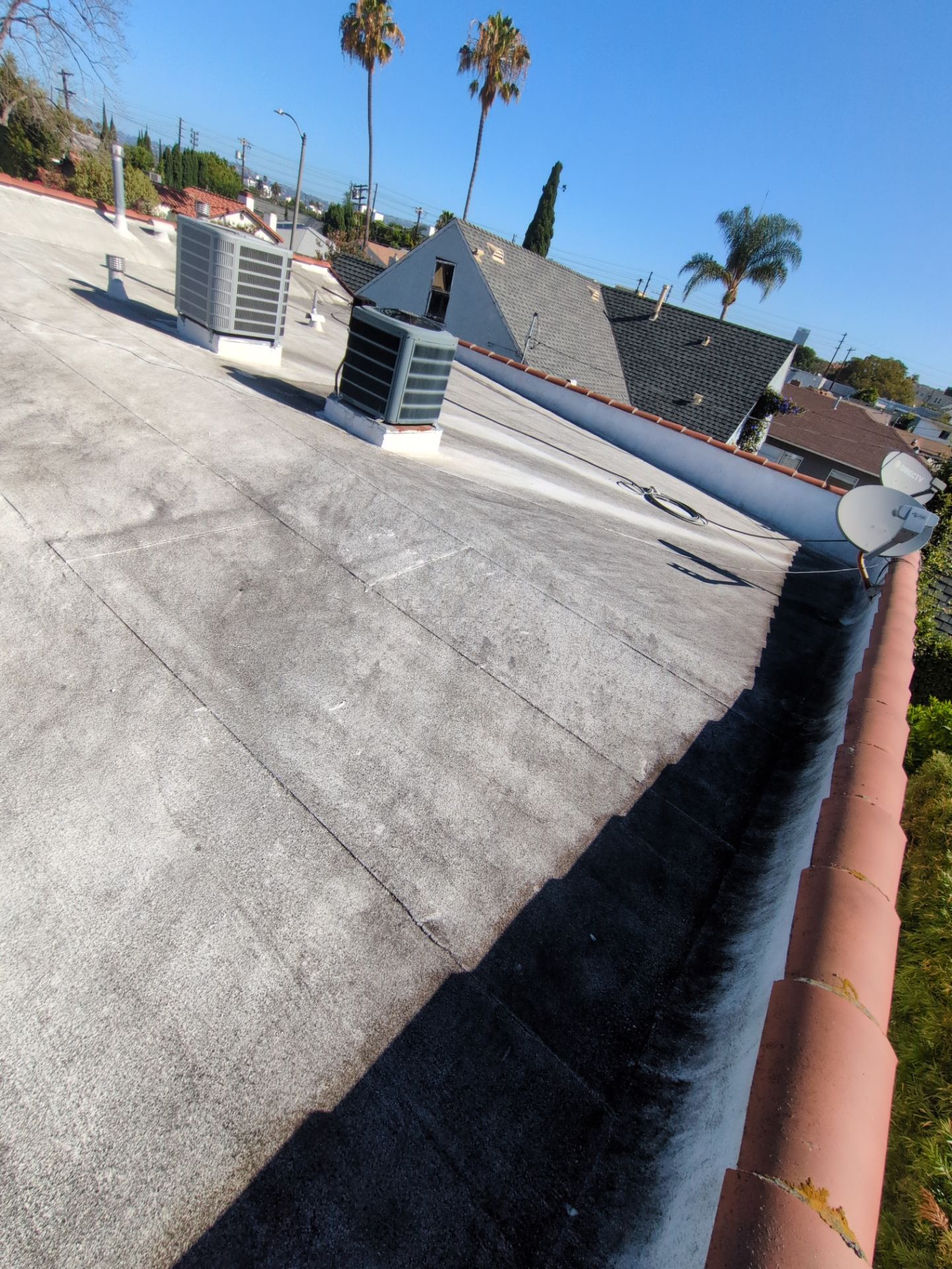 Los Angeles Flat Roof Restoration with White Reflective Coating by Hull Brothers Roofing