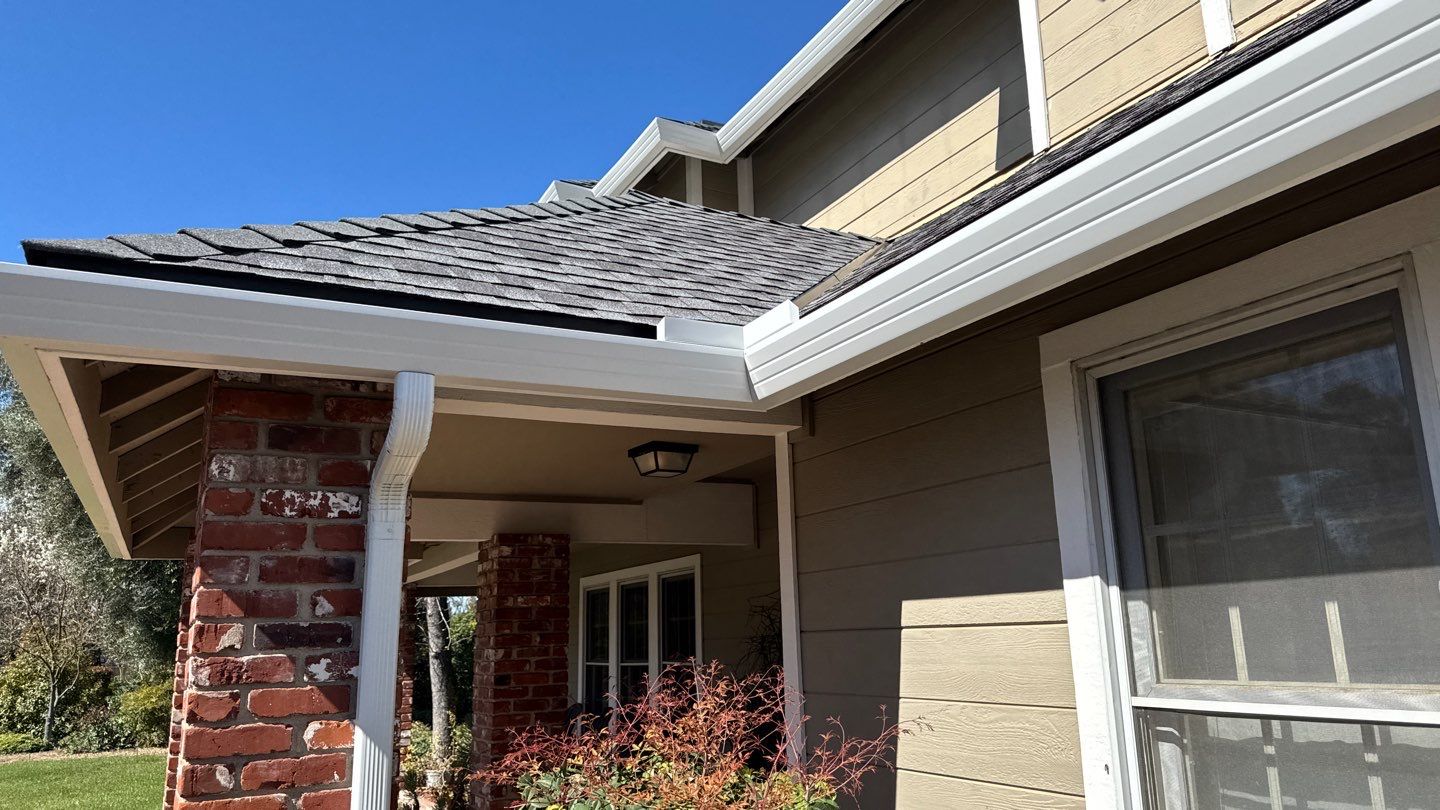 New shingles and gutters using GAF Timberline HDZ shingles and aluminum gutter by Straight Edge Roofing Inc