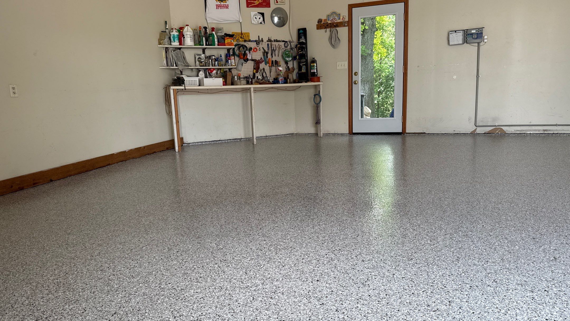 The Perfect Day To Install A Beautiful Coyote Flake Floor by Banner Garage