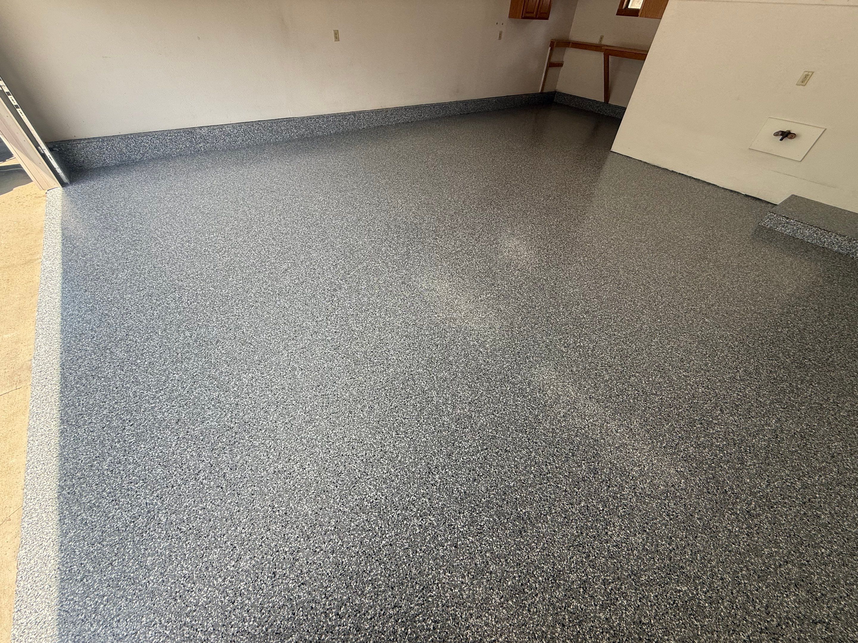 Smoke Flake Garage Floor Coating in Dell Rapids by Select Painting, Coatings & Garage Cabinets