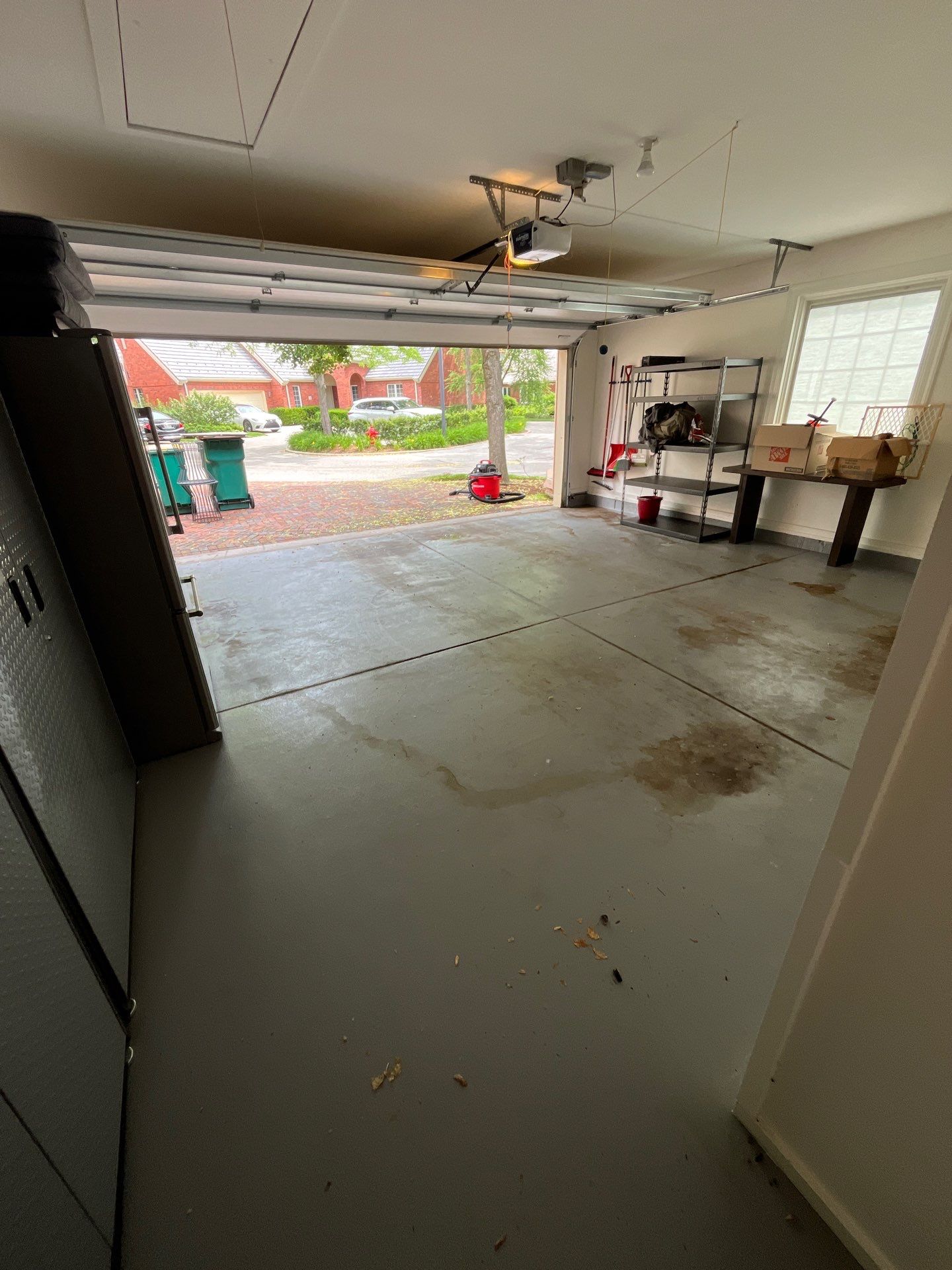 epoxy garage floor cleaning using degreaser by Northern Power Washing LLC.
