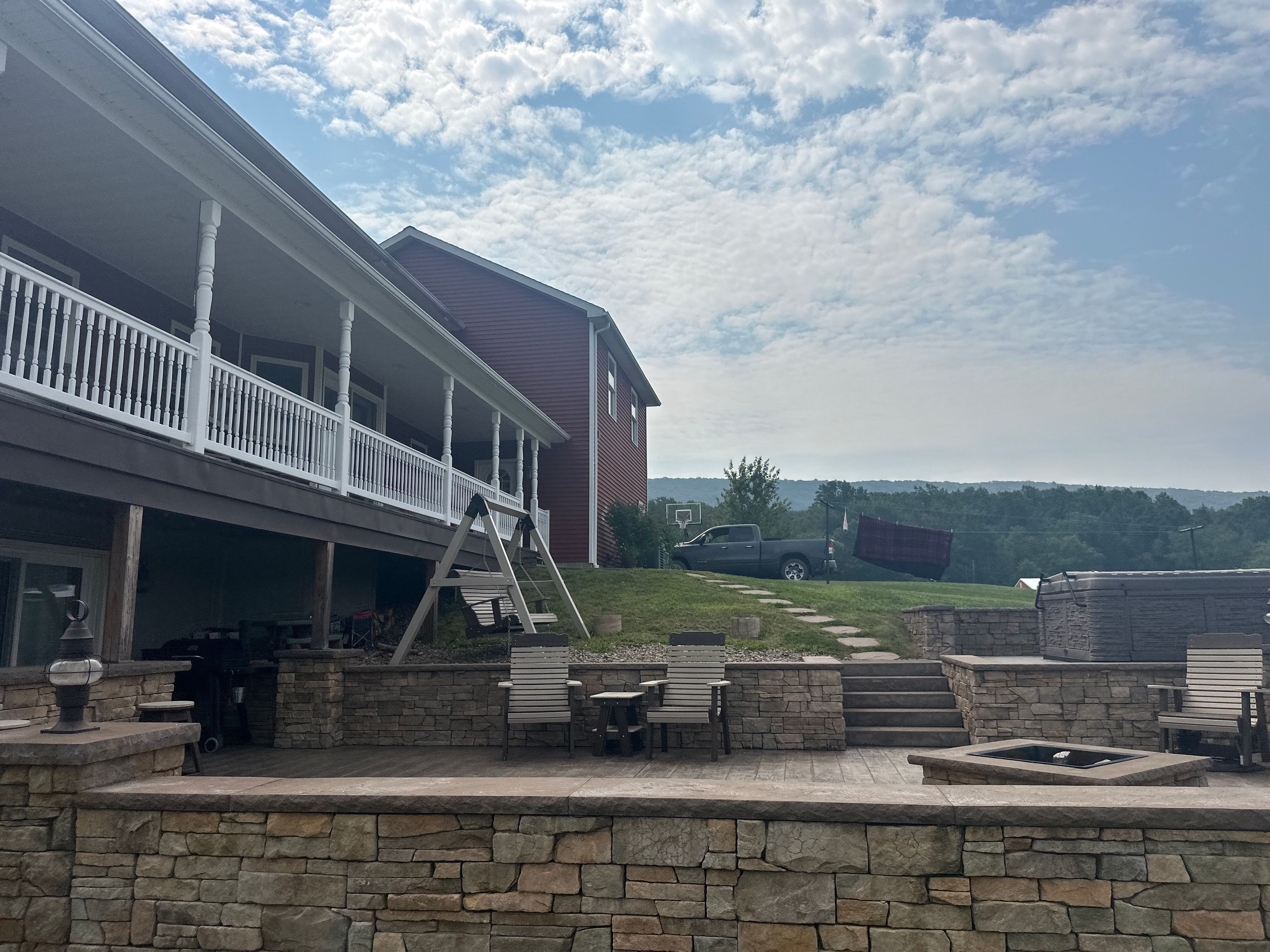 Covered Deck Addition With Custom Gable Roof in Tower City by Esh Builders
