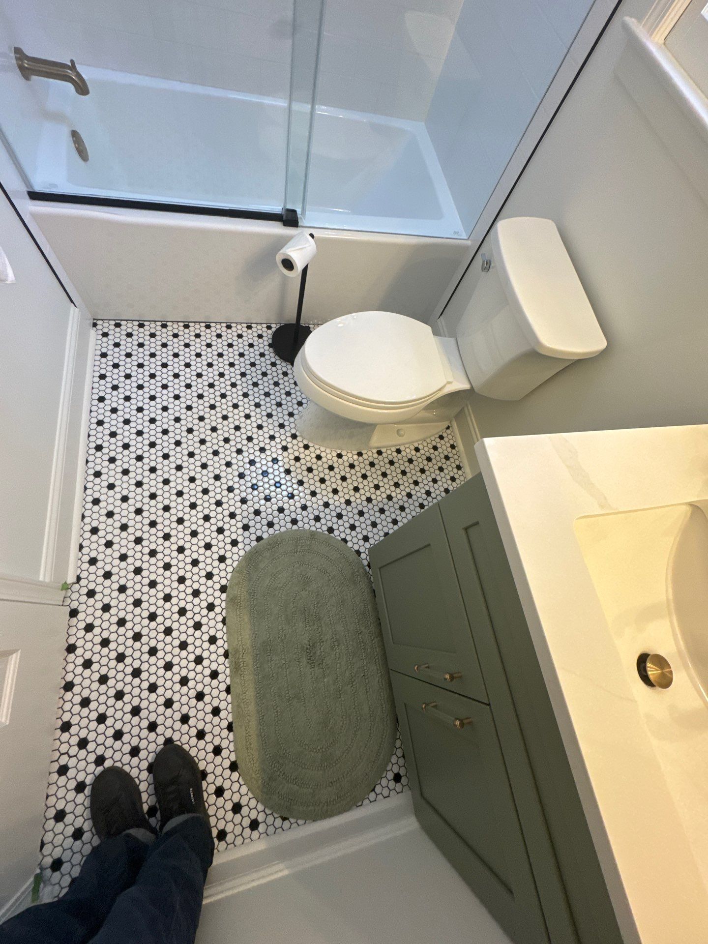 Smyrna Bathroom Remodel Featuring Sage Green Vanity and Hexagonal Tile by Swift Home Renovations