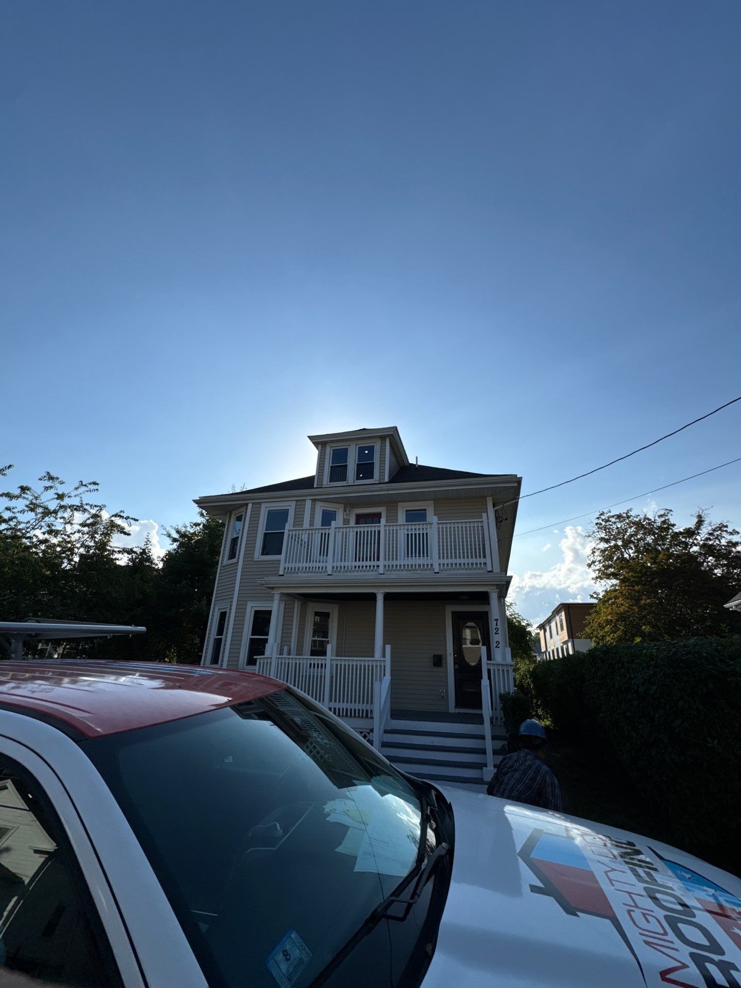 Roof Replacement with Skylight Flashing in Waltham, MA by Mighty Dog Roofing of Greater Middlesex County