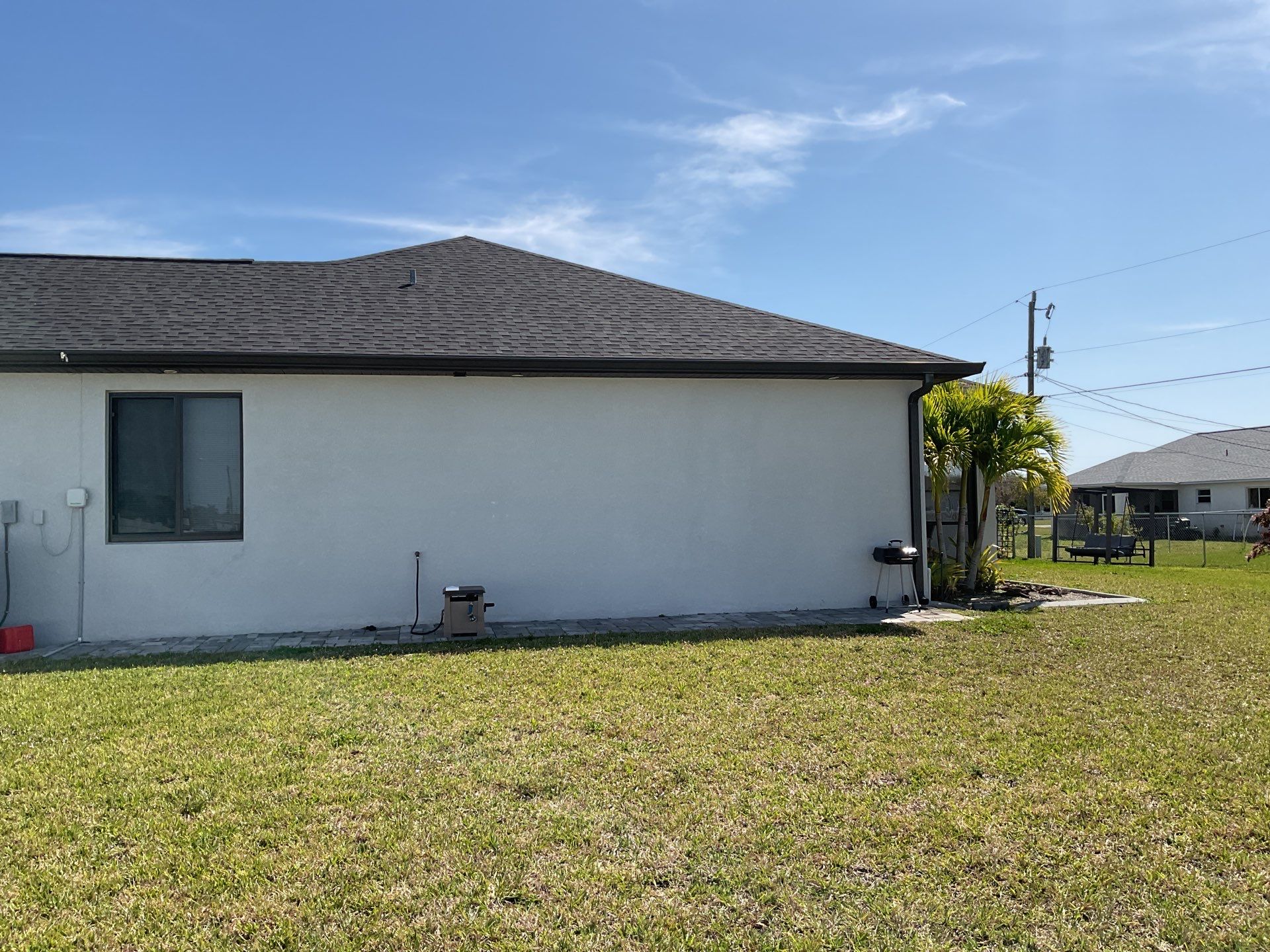 Black Seamless Gutters using 6 Inch Seamless Gutters in Cape Coral FL by Gutter Professors