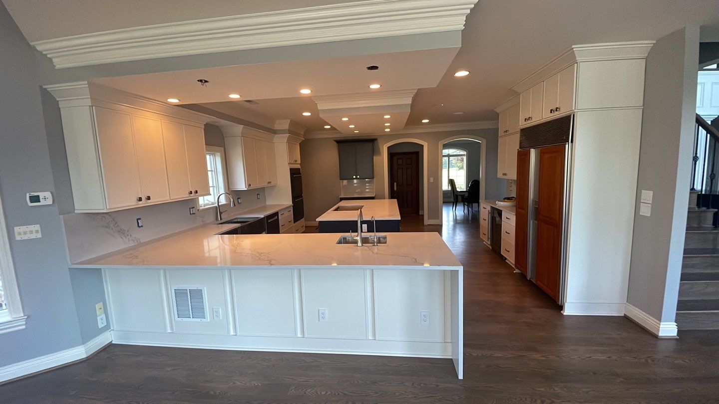 Kitchen Remodel using Fabuwood Luna Dove and Indigo Cabinetry by HomeWerkes Design & Build