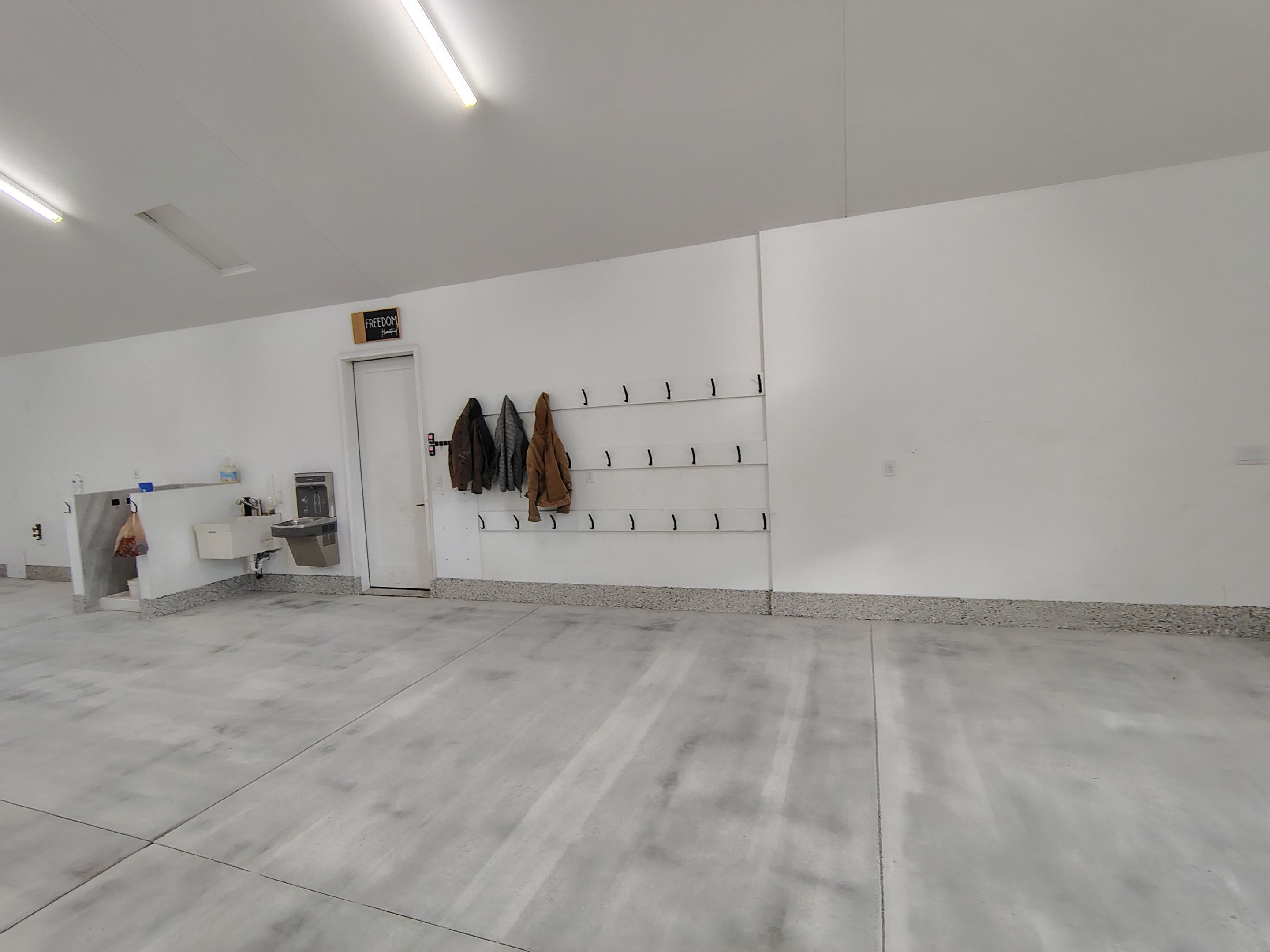 Epoxy Flake Garage Floor and Stair Coating in Sioux Falls by Select Painting, Coatings & Garage Cabinets