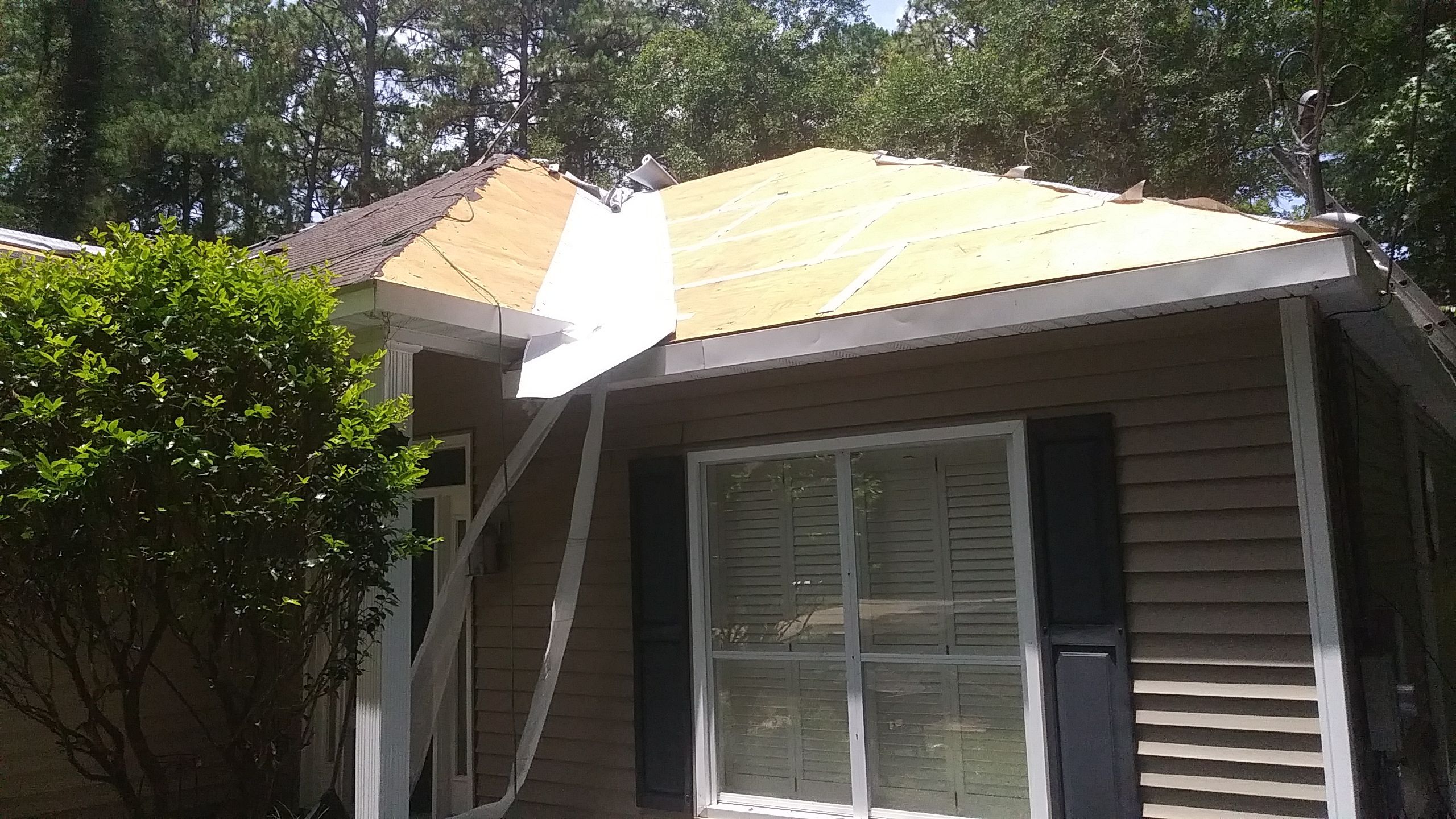 Residential Roofing Installation using Roof Replacement by American Roofing & Construction LLC