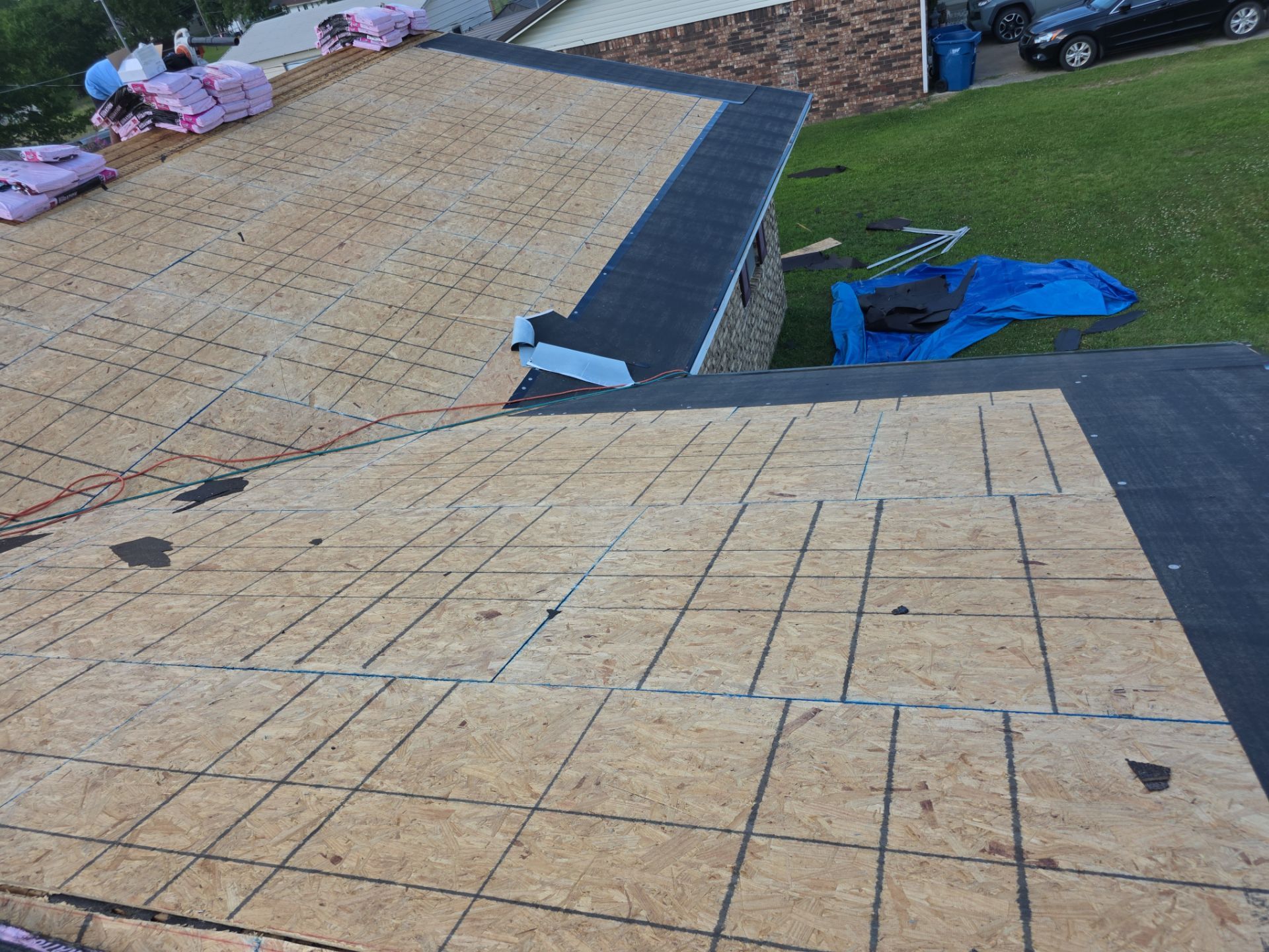 New roof & siding paid by insurance. Along with new roof sheathing.  by In & Out Construction & Remodeling, LLC
