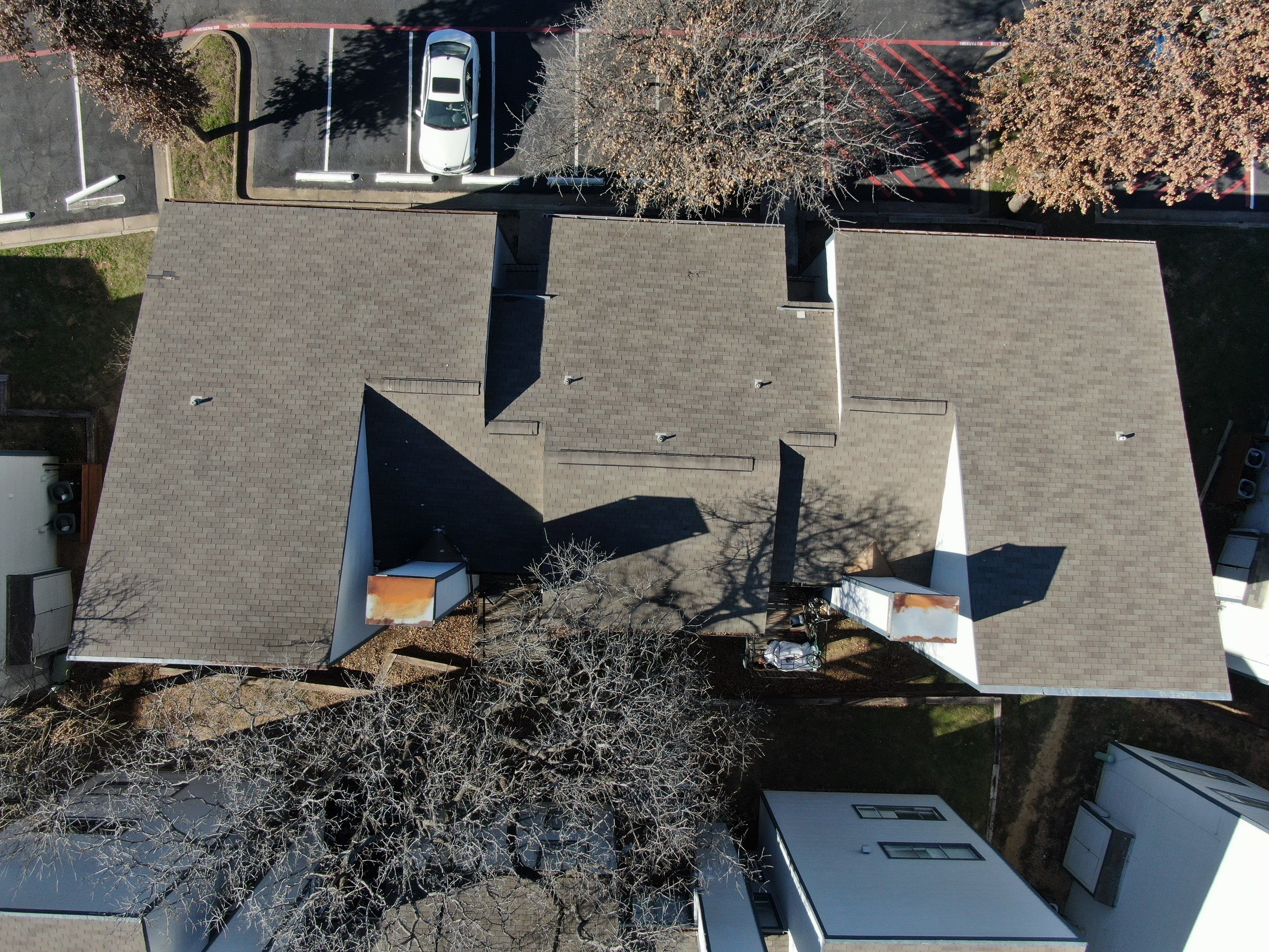 Apartment Roofing Repairs using Certainteed xt25 by Becker Roofing and Exteriors