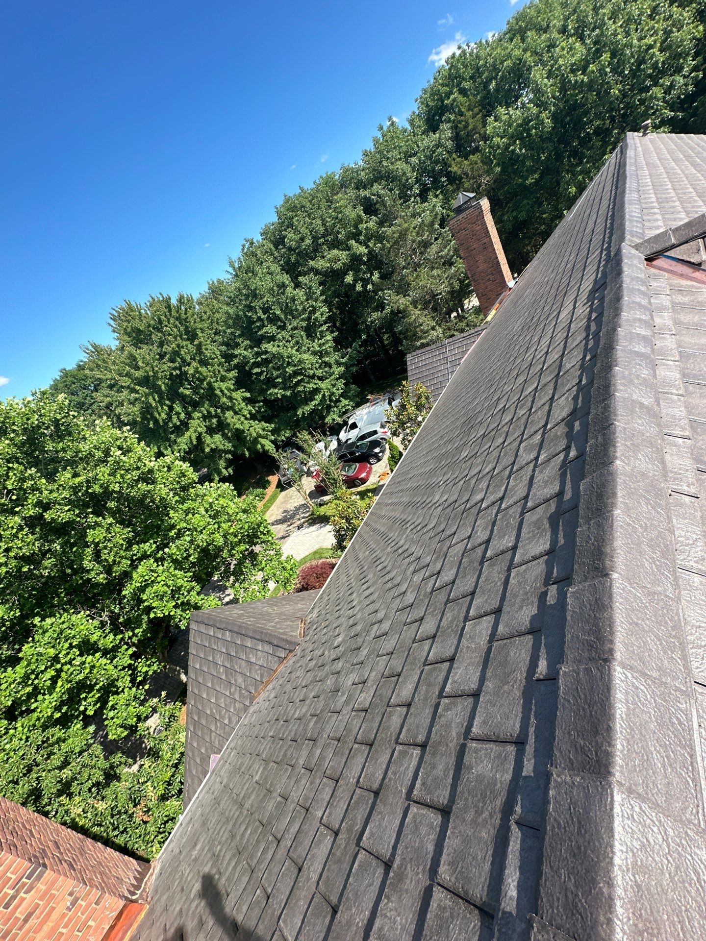 Residential Roofing Installation Using Enviroshake Synthetic Slate by Undersun Roofing 