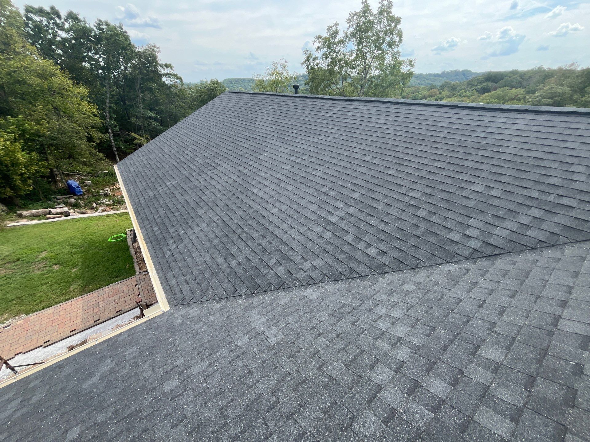 Residential Roofing + Gutters & Downspouts Install  by Titan Commercial & Residential Roofing 