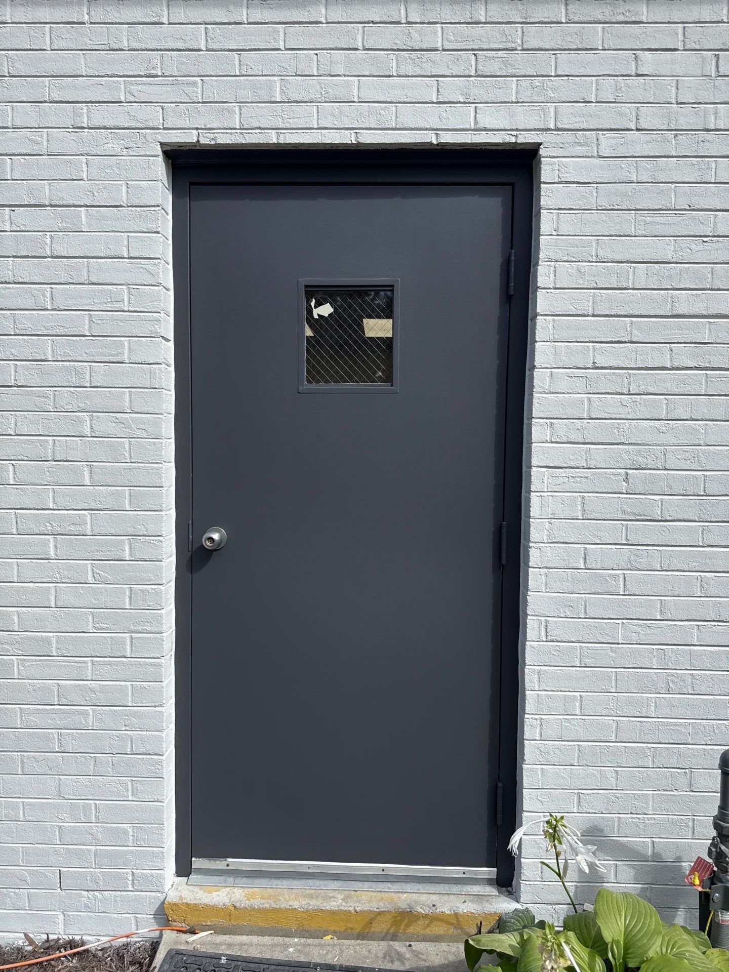 Church Exterior Brick Painting with Romabio Masonry Flat by Highfill Painting