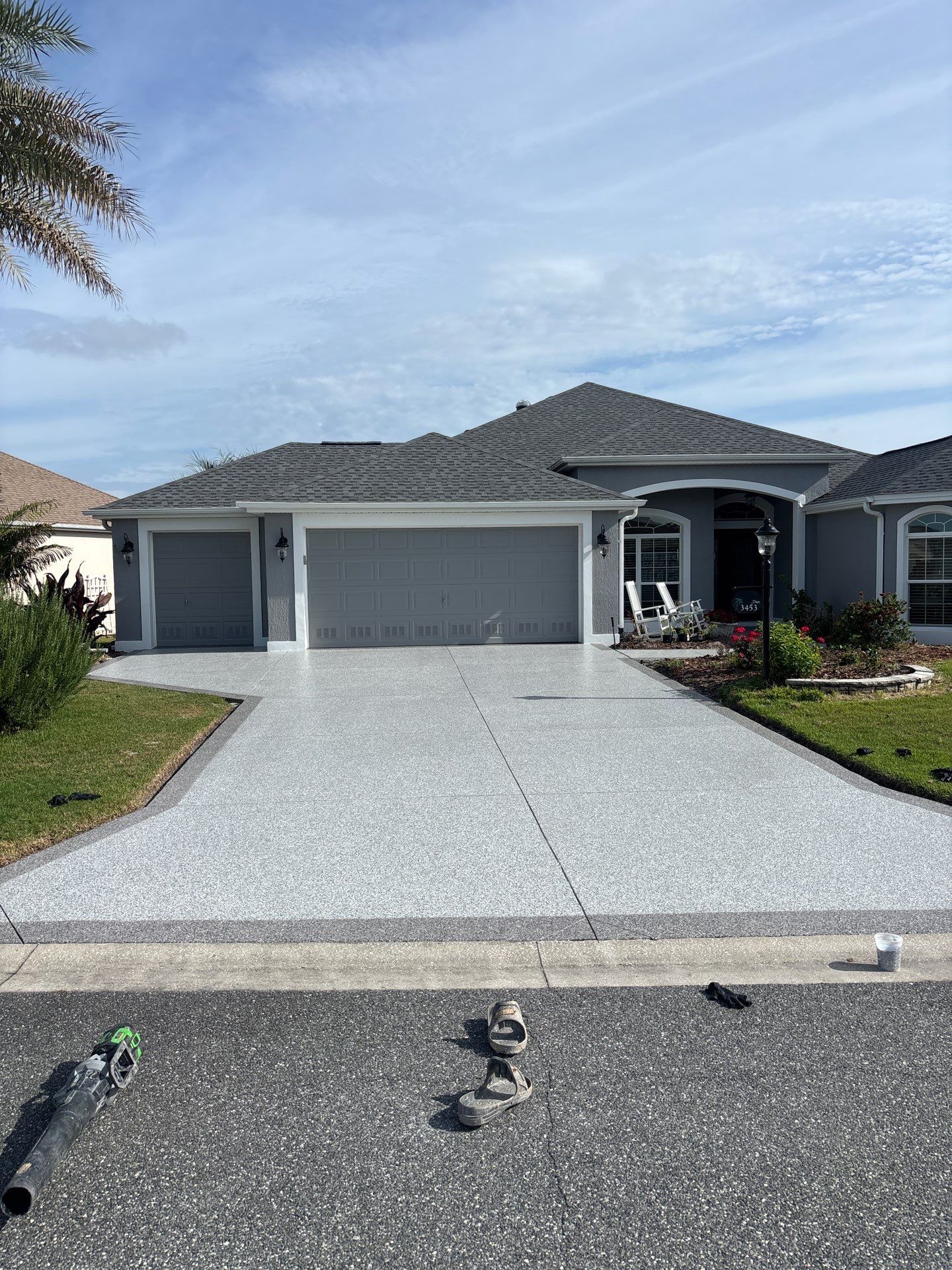 Driveway & Sidewalk Slatestone with Silvercreek borders by Innovative Concrete Coatings 