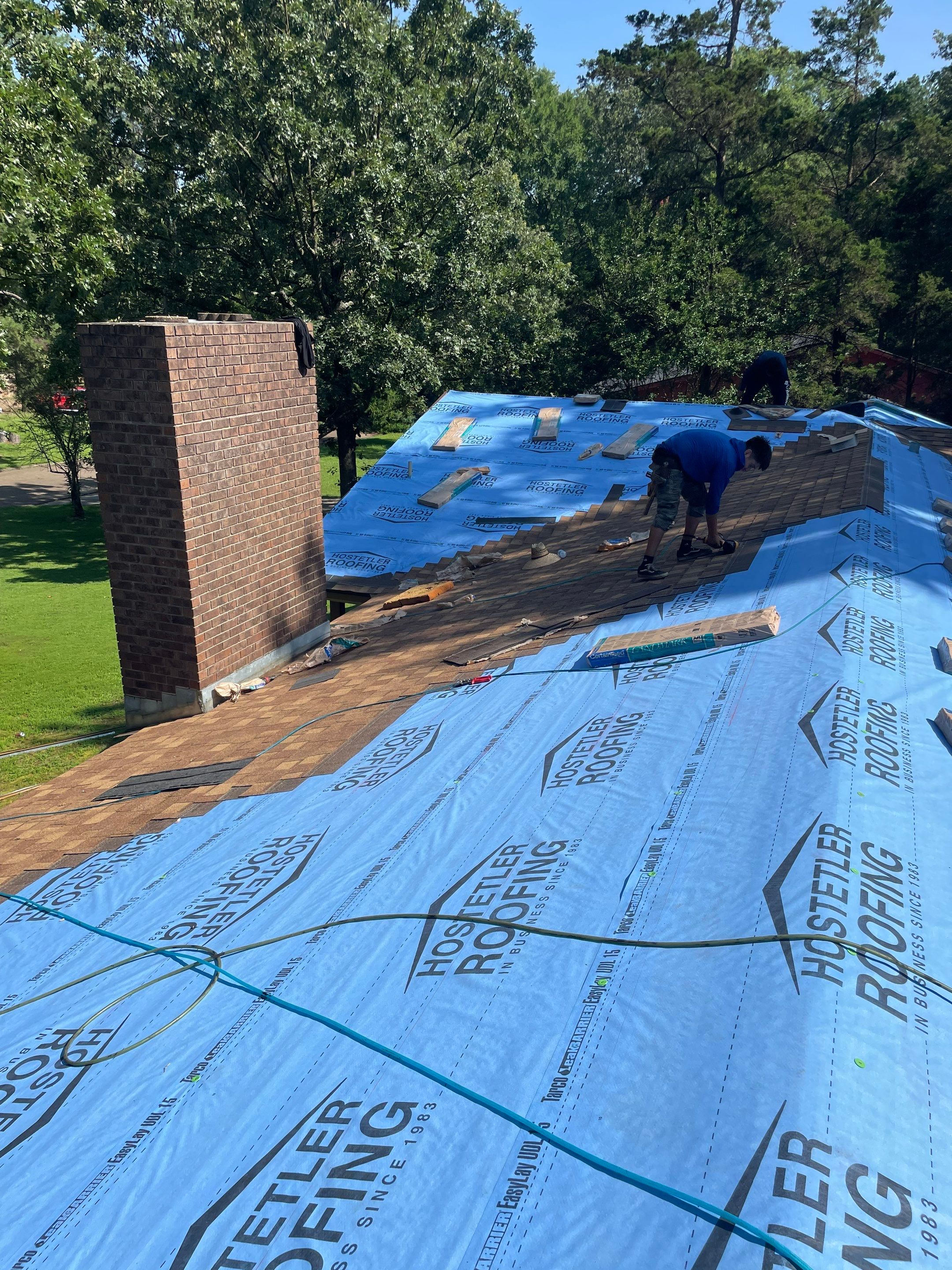 Storm Restoration Reroof: 25 Year 3-Tab Shingle by Hostetler Roofing