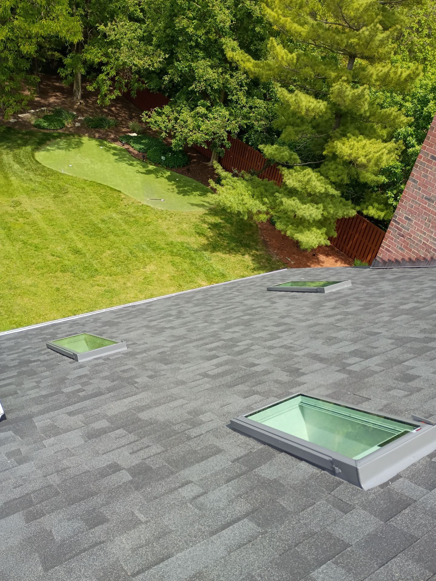 Asphalt Shingle Roof Replacement and Skylight Installation in Darien by Pro Home Services Inc
