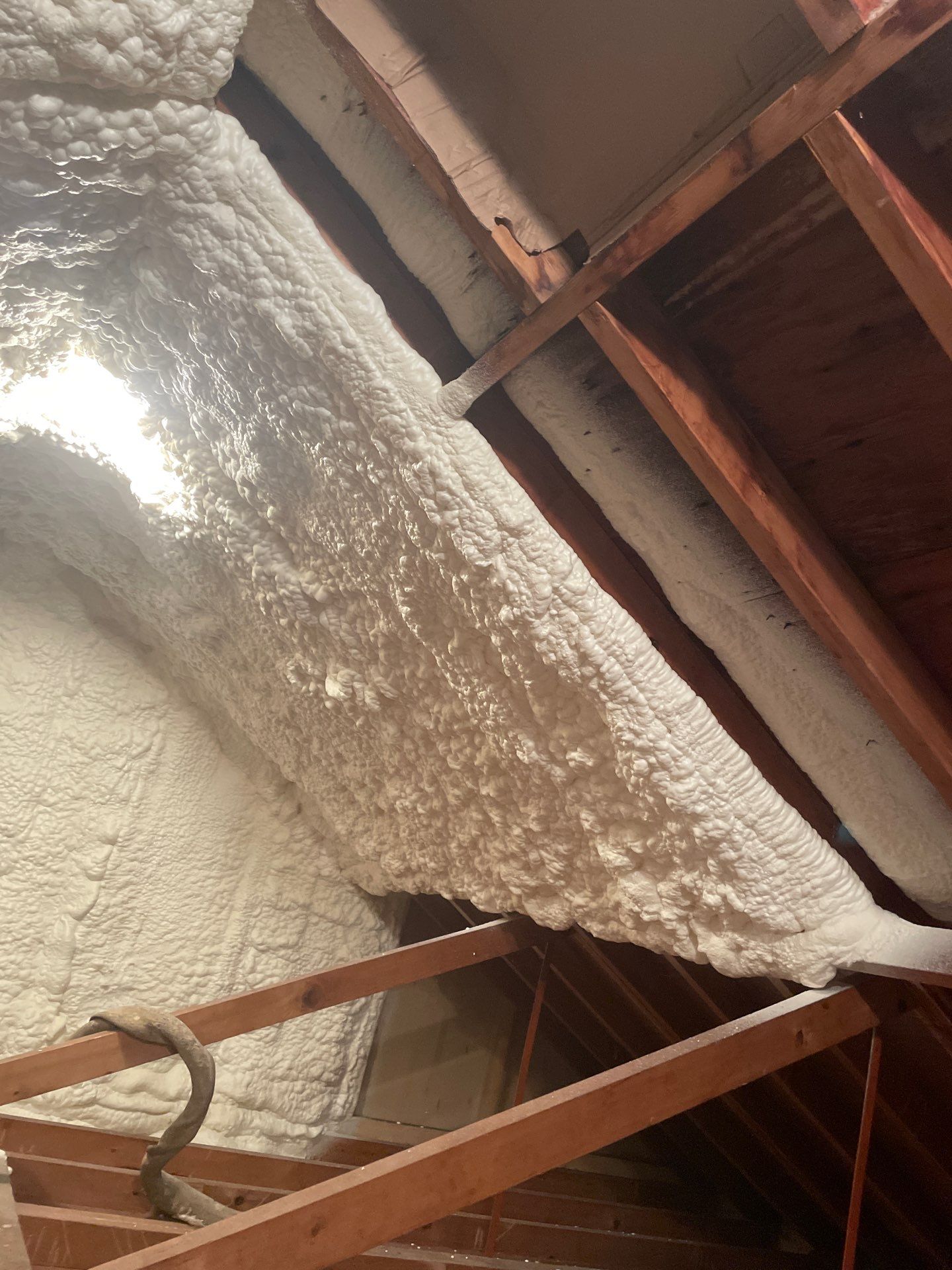 Attic Insulation using open cell spray foam by NYS Foam & Energy