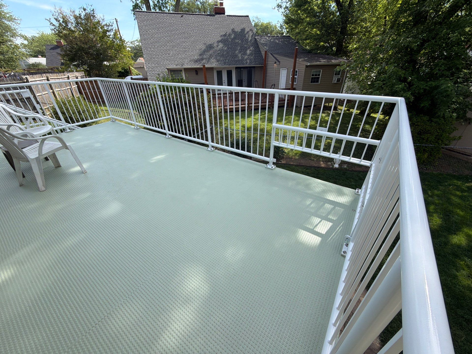 White Powder-Coated Outdoor Railings in Rockville & Staircase and Deck Refurbishment  by Capitol Iron Works