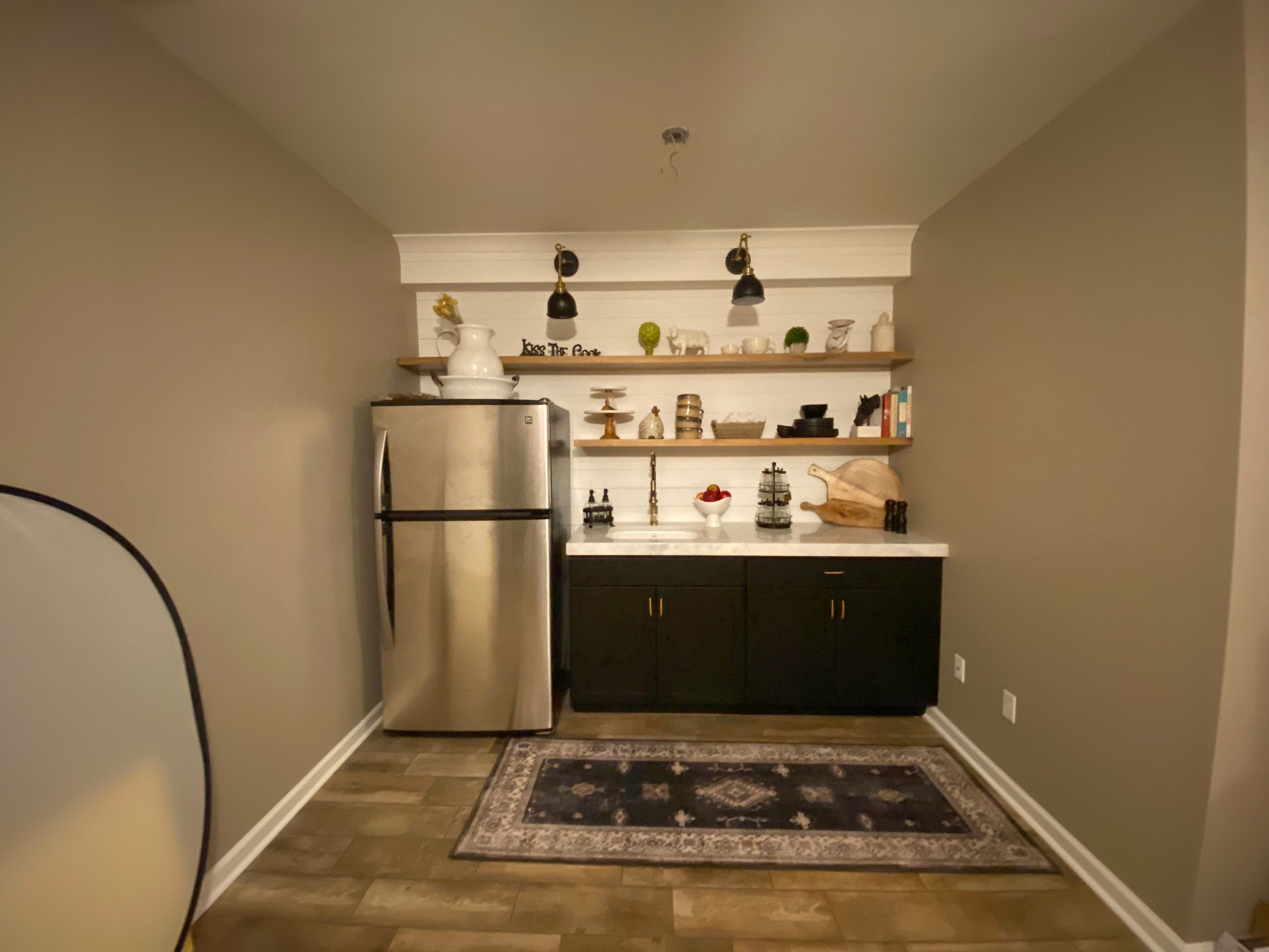 Woodstock Basement Kitchen Remodel with Custom Cabinetry and Tile Flooring by Swift Home Renovations