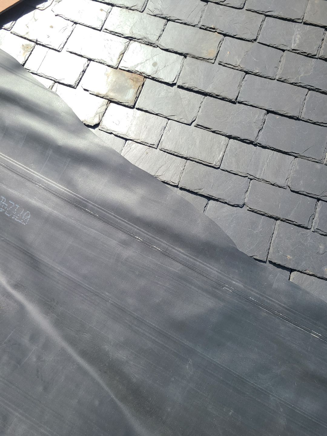 Lorton: EPDM Flat Roof with Partial Slate Replacement by RM Banning, Inc.