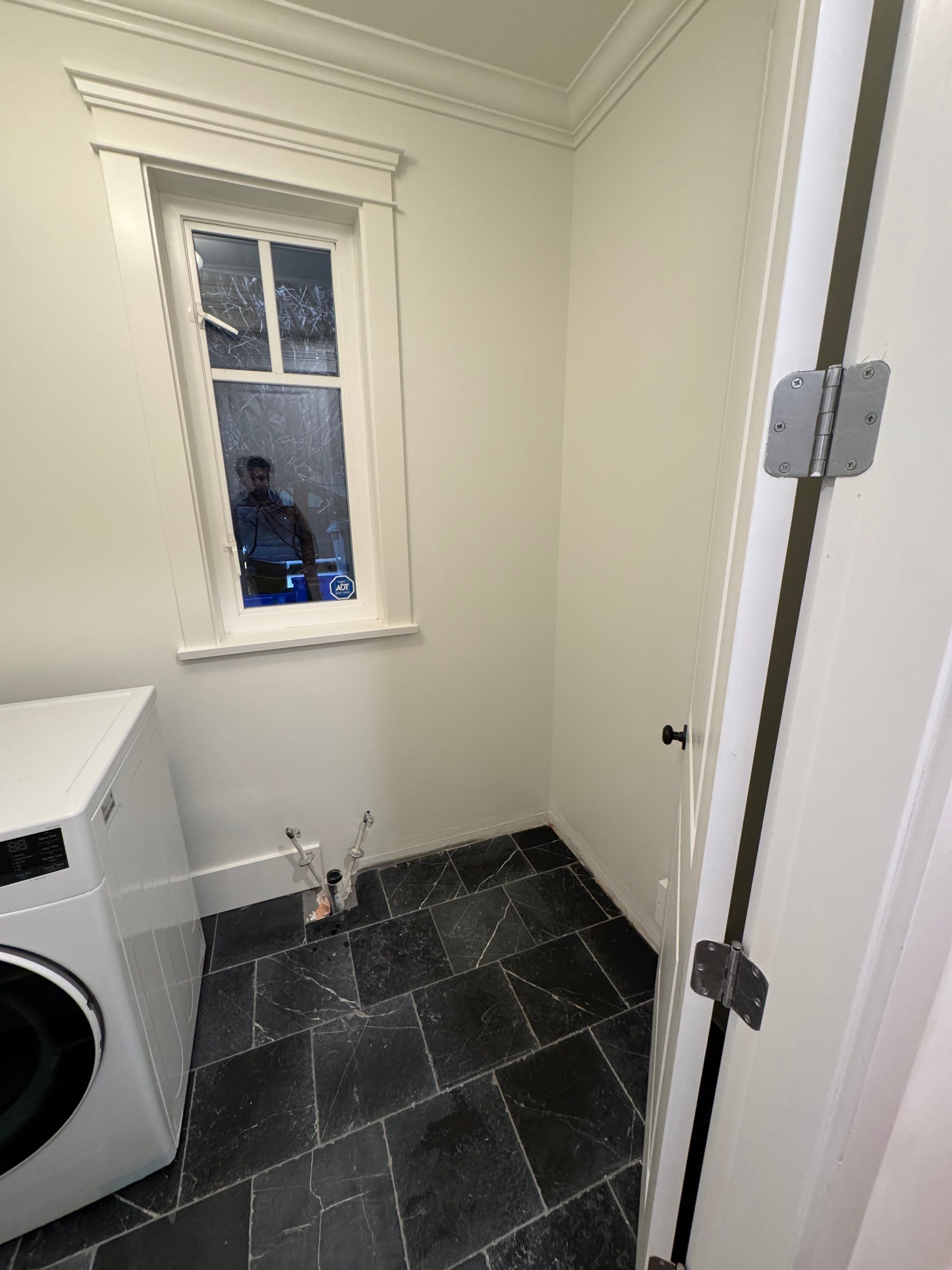 High-End Laundry Room Renovation and Restoration in Vancouver by YVR Construction Group