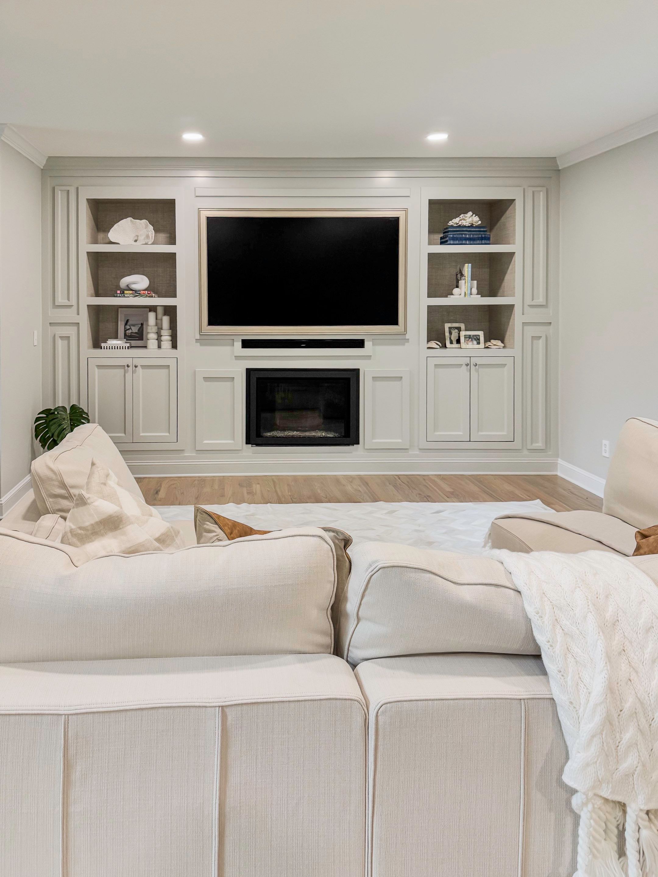 Built-in TV unit by Trendy Walls Inc.