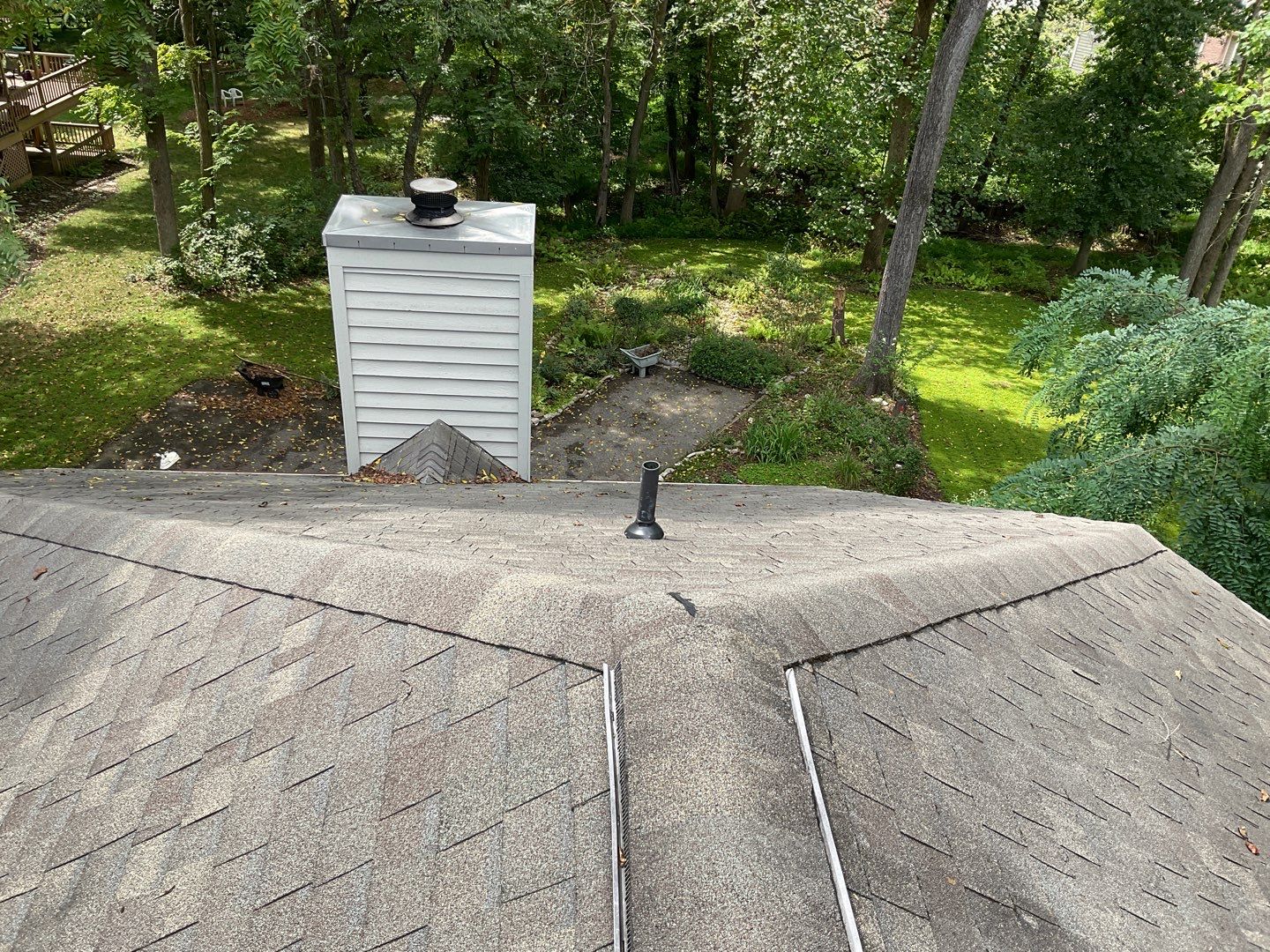 Install new shingles and new skylights  by Alpha Design Services