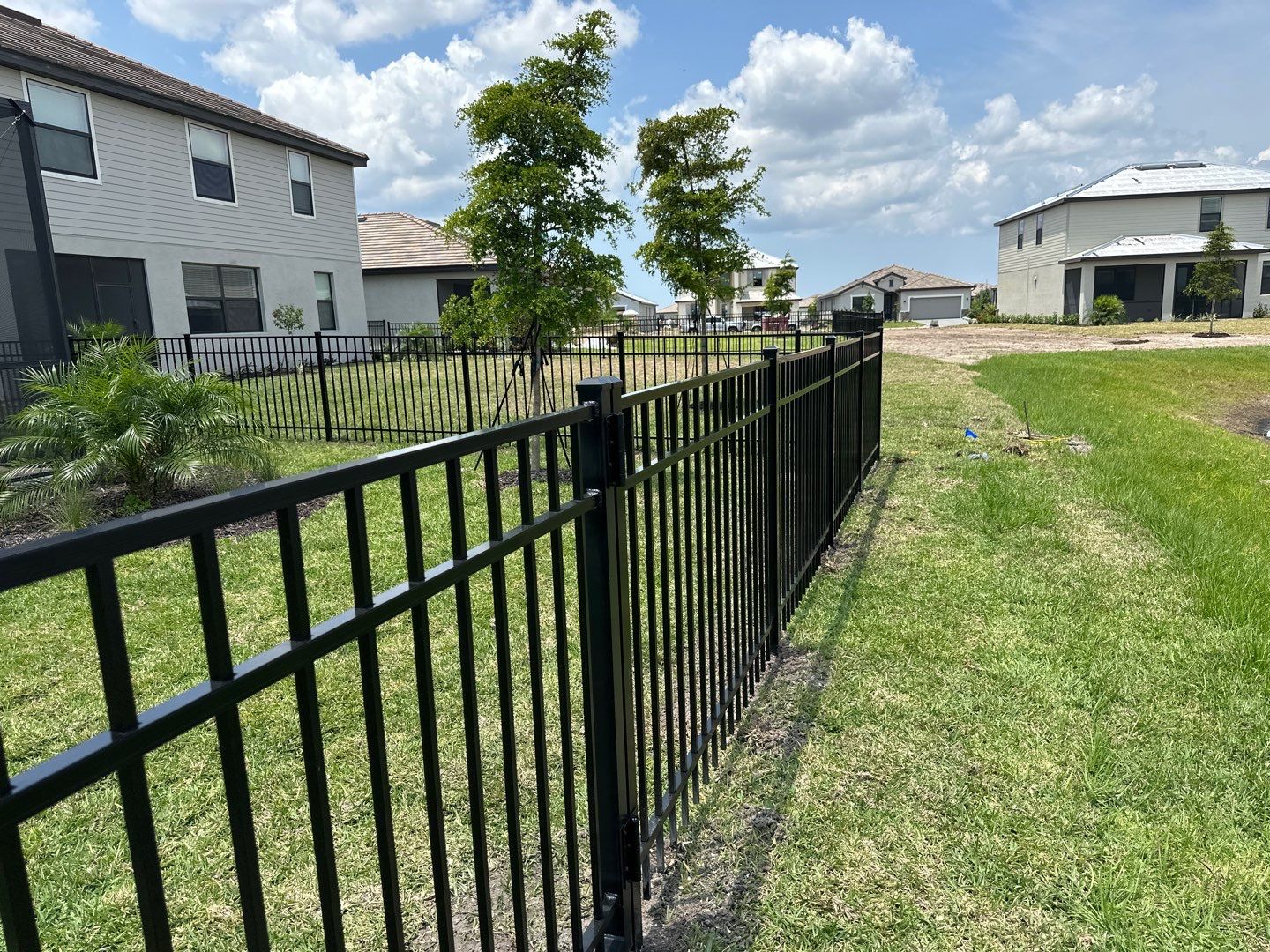 Aluminum Fence Installation using Black 3 Rail Aluminum Fence by Asap fence and gates, LLC